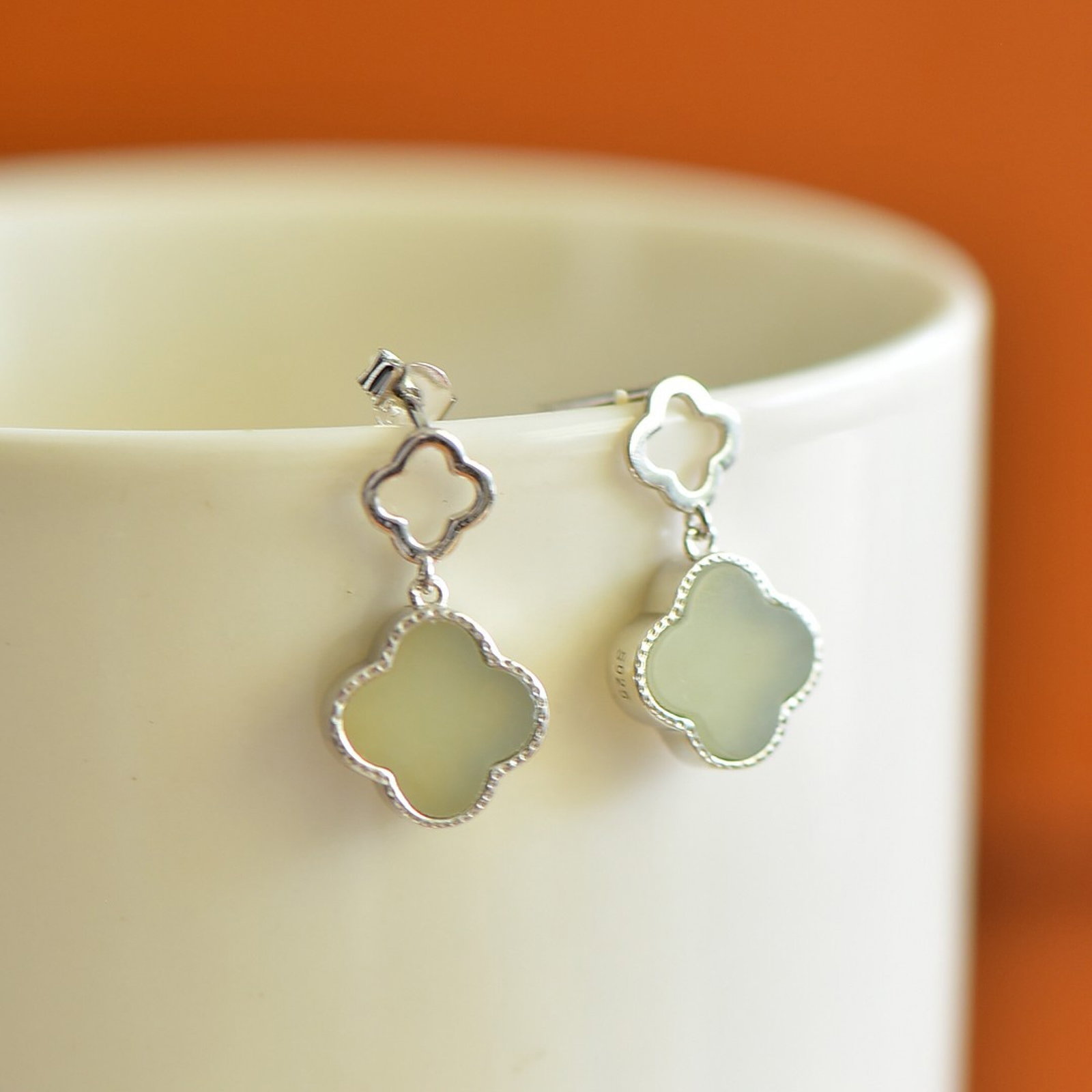 A Pair of Exquisite Sterling Silver Inlaid White Jade Earrings: A Pair of Exquisite Sterling Silver Inlaid White Jade Earrings,Size:10mmx10mm 一对纯银镶白玉耳环