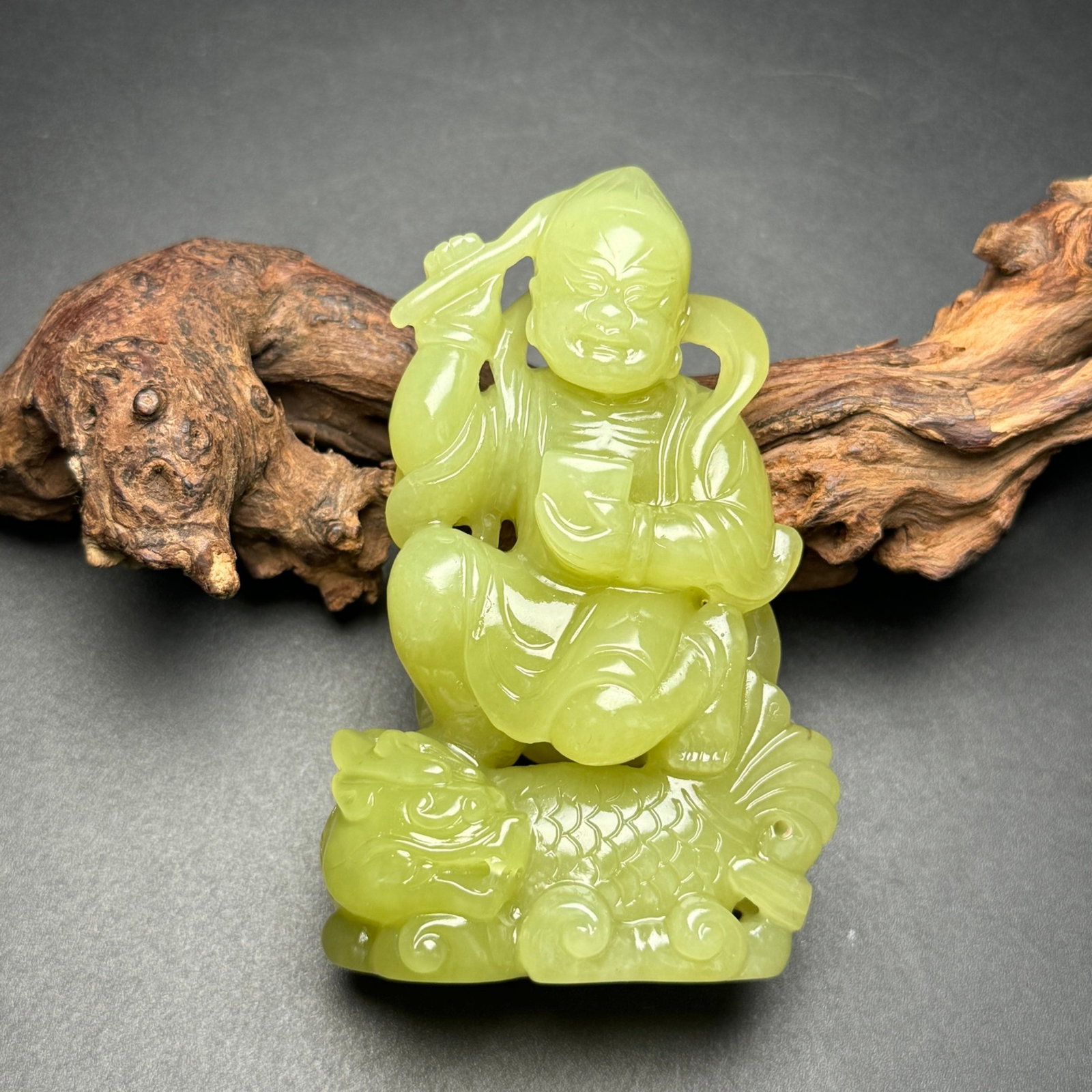 An Exquisite Yellow Jade Figure Kylin Ornament: An Exquisite Yellow Jade Figure Kylin Ornament,Qing Dynasty,China,Size:50mmx81mmx23mm,Weight:103g 黄玉人物麒麟摆件,中国清代