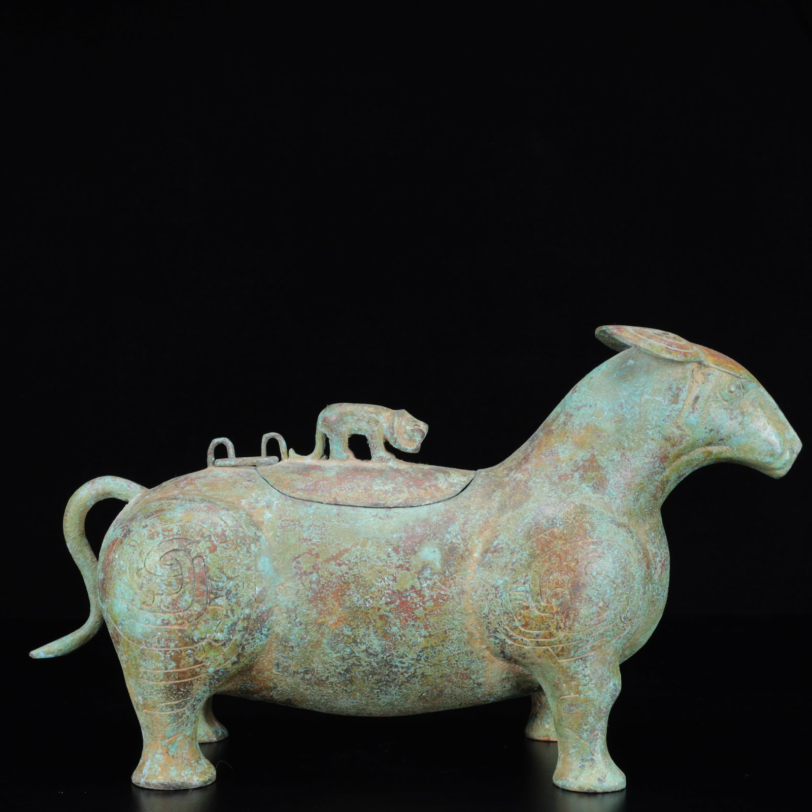 An Archaic Bronze Auspicious Beast Censer,with Inscription: An Archaic Bronze Auspicious Beast Censer,with Inscription,the Warring States Period in China,Size:14.2inx4.3inx8.3in,Weight:2850g 青铜瑞兽香炉,带铭