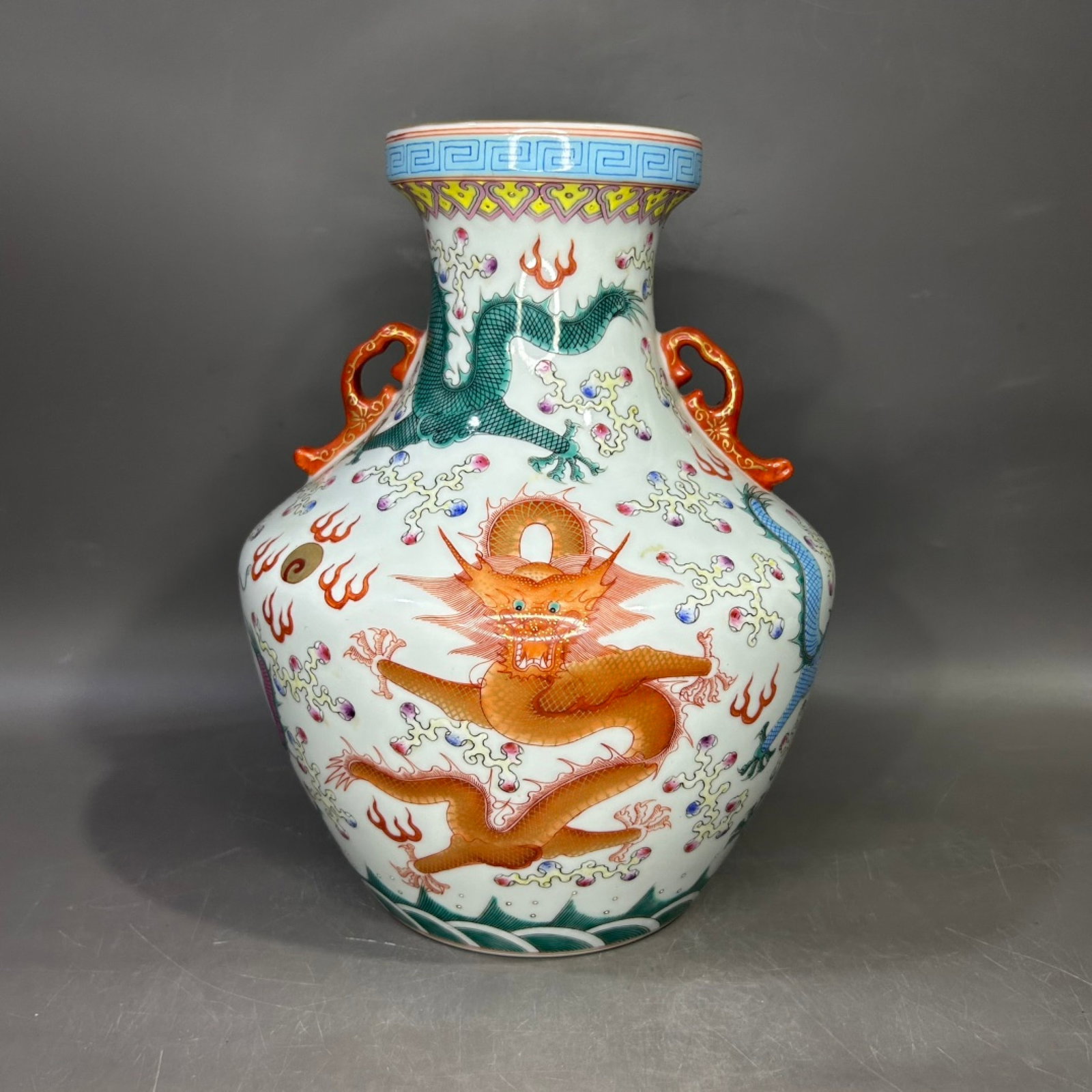 A Rare Famille-Rose Painted Gold Auspicious Cloud and Dragon Pattern Double-Ears Vase: A Rare Famille-Rose Painted Gold Auspicious Cloud and Dragon Pattern Double-Ears Vase,Qing Dynasty,China,Yongzheng Six-character Mark,Size:14.4inx7.1in 粉彩描金祥云