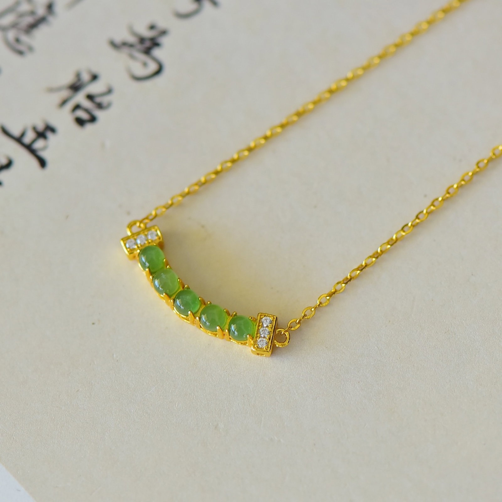 An Exquisite Sterling Silver-Gold Plated Inlaid White Jade Pendant: An Exquisite Sterling Silver-Gold Plated Inlaid White Jade Pendant,Size:3mmx3mm 纯银镀金镶白玉吊坠