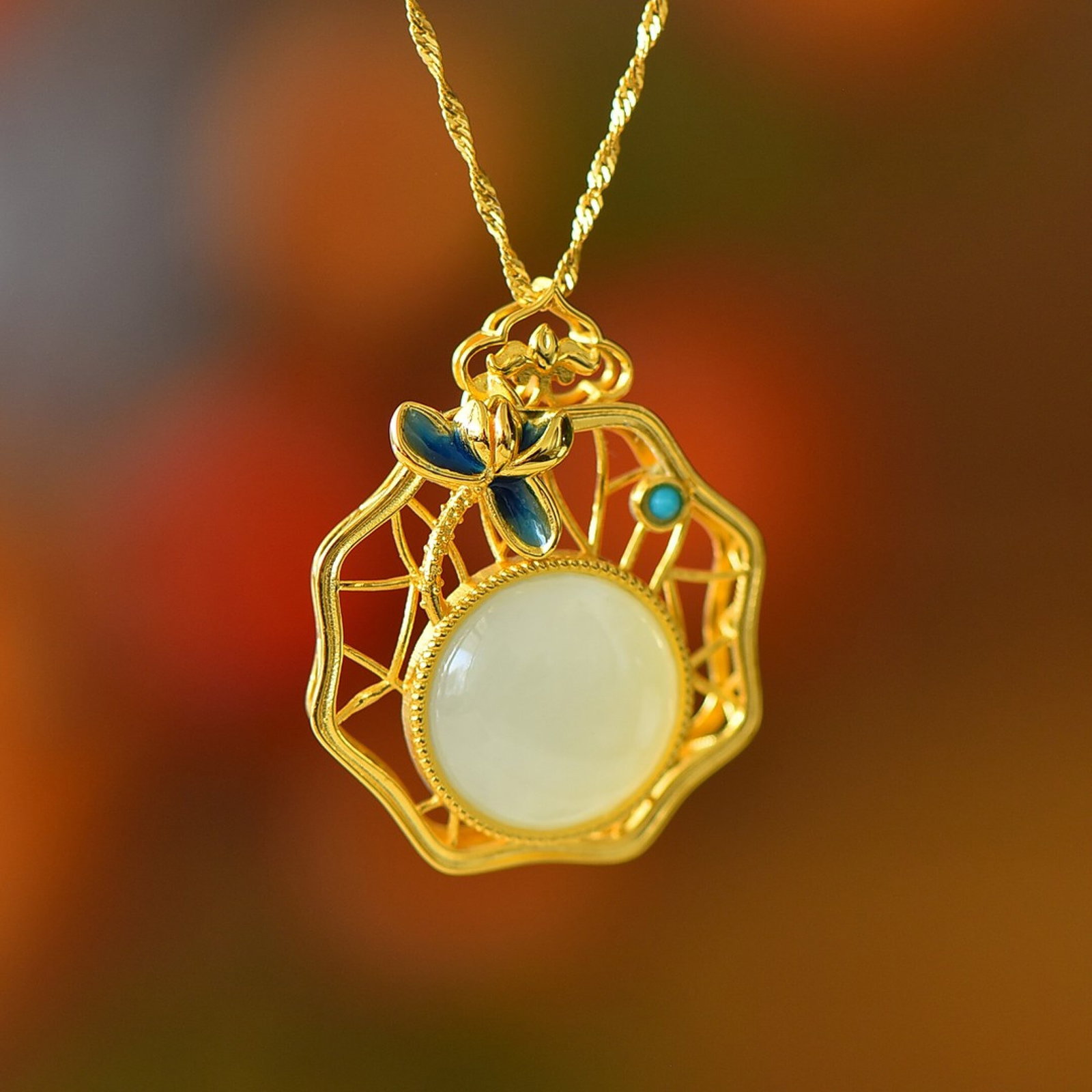 An Exquisite Sterling Silver-Gold Plated Inlaid White Jade Pendant: An Exquisite Sterling Silver-Gold Plated Inlaid White Jade Pendant,Size:16mmx16mm 纯银镀金镶白玉吊坠