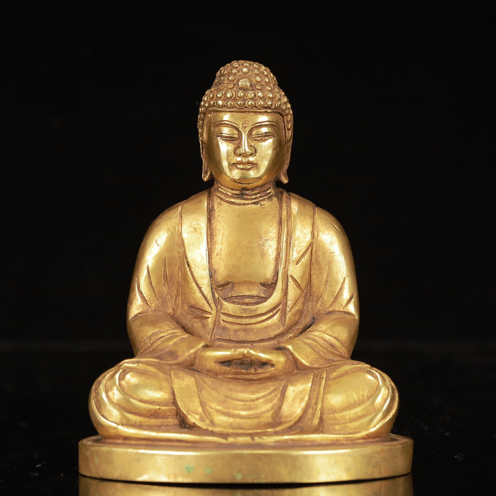 An Exquisite Gilt Bronze Statue of Sakyamuni: An Exquisite Gilt Bronze Statue of Sakyamuni,Qing Dynasty, China,Size:3.9inx3.1inx4.7in,Weight:1300g 铜鎏金释迦摩尼像,中国清代