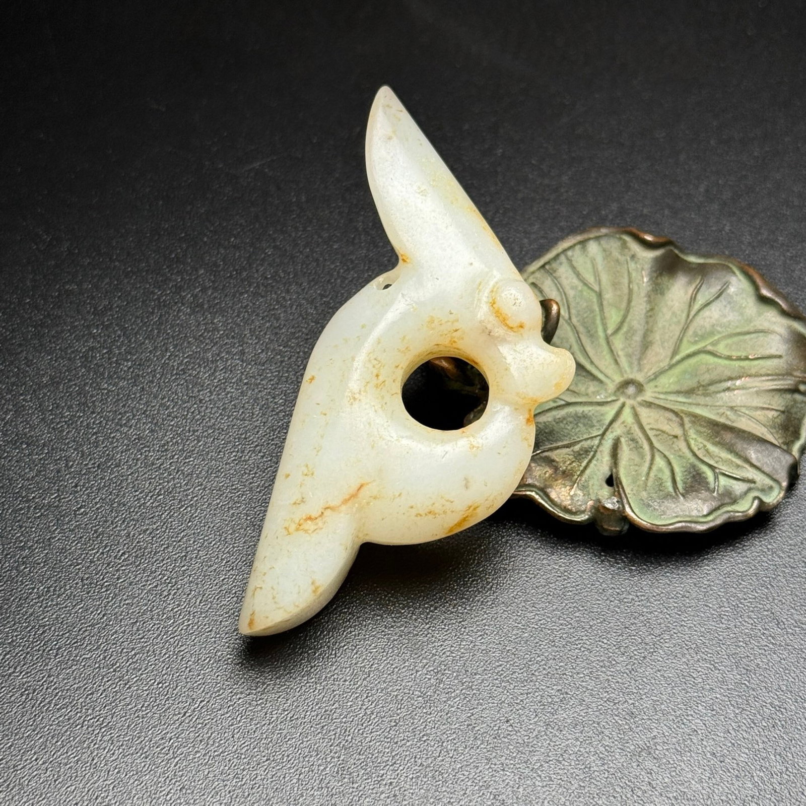 An Exquisite White Jade Pig-Dragon Pendant: An Exquisite White Jade Pig-Dragon Pendant,Qing Dynasty,China,Size:71mmx32mmx13mm,Weight:35g 白玉猪龙挂件,中国清代