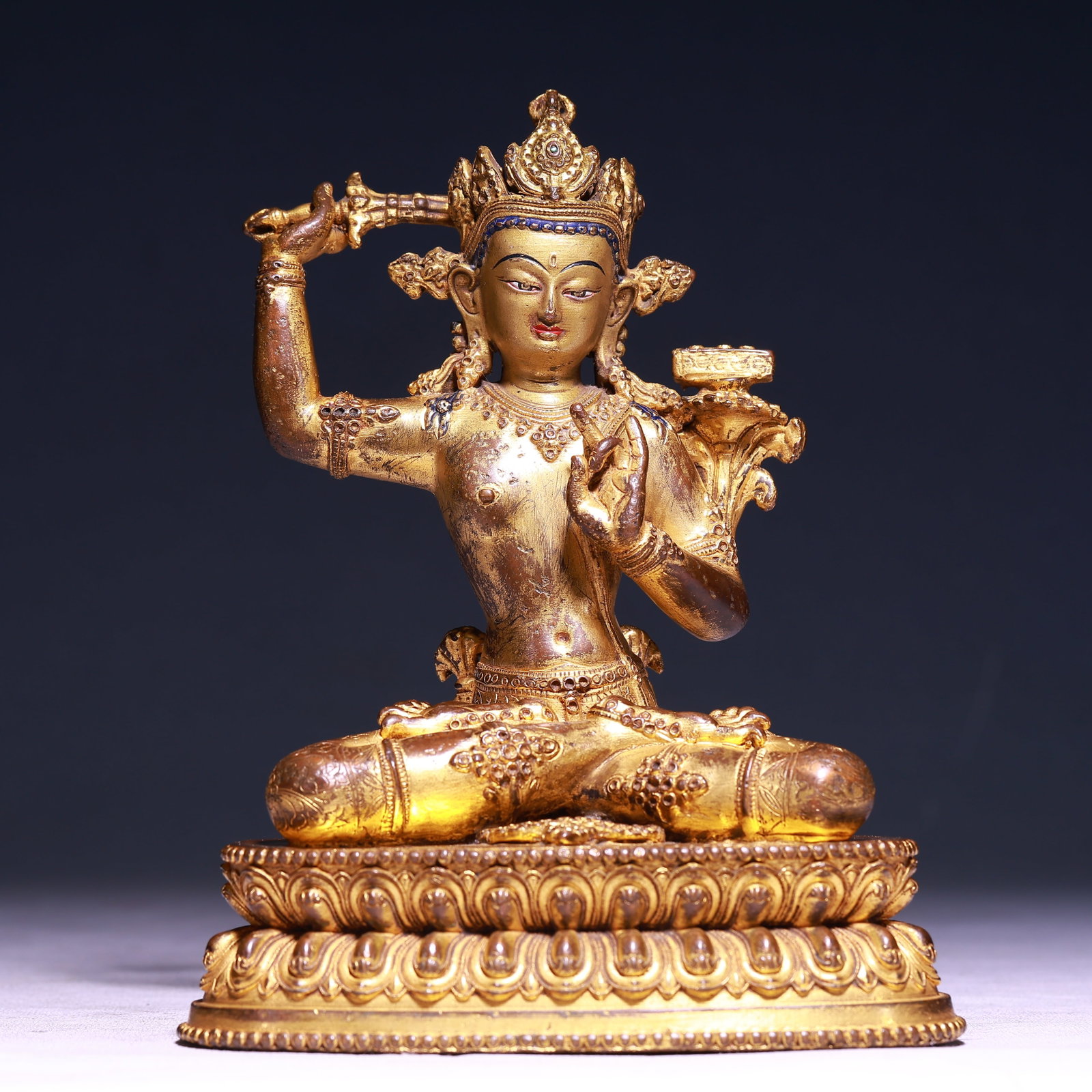 A Solemn Gilt Bronze Statue of Manjusri: A Solemn Gilt Bronze Statue of Manjusri,Qing Dynasty,China,Size:6.3inx3.9inx7.9in,Weight:2000g 铜鎏金文殊菩萨像,中国清代