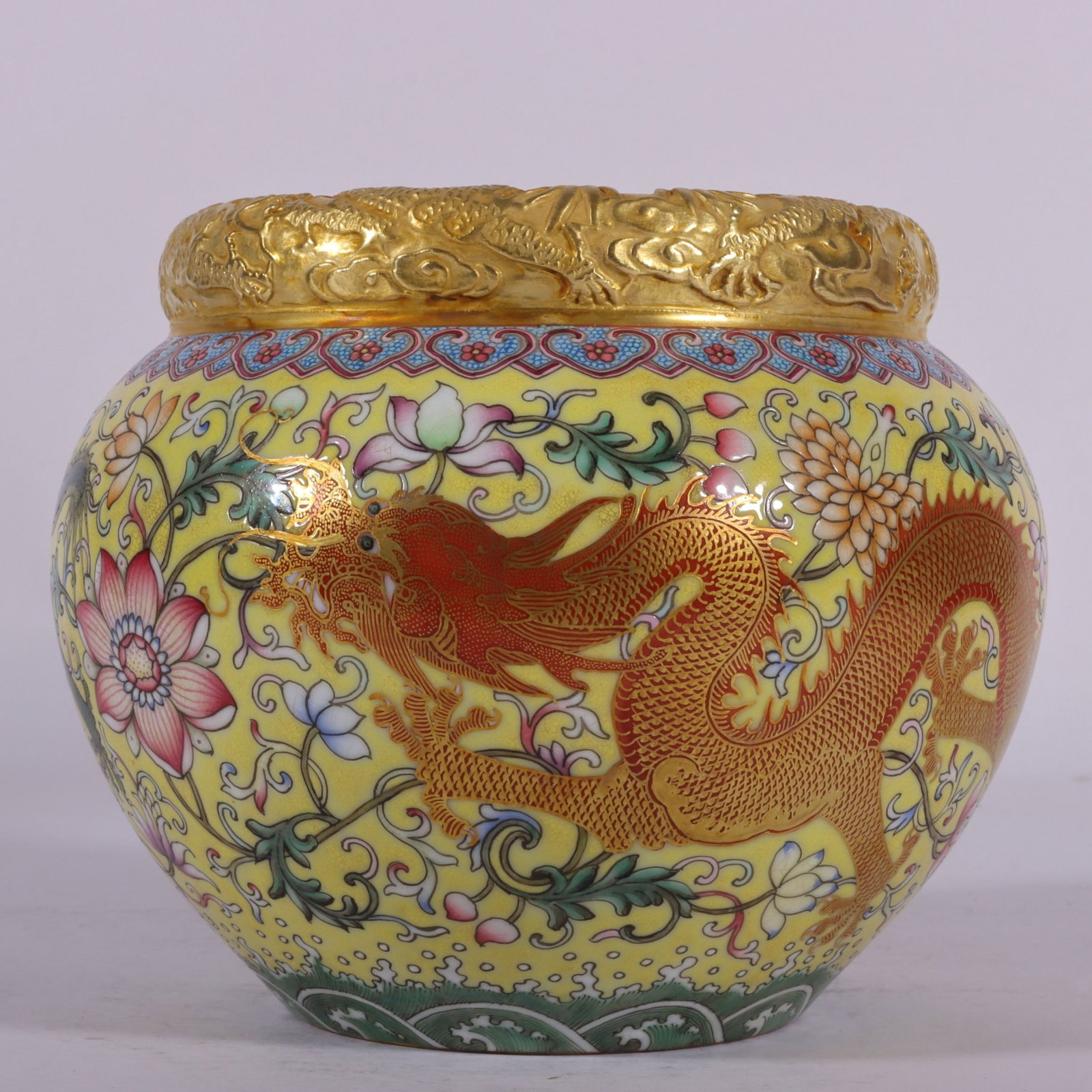 An Exquisite Enamel Yellow Ground Painted Gold Lotus and Dragon Pattern Water Pot: An Exquisite Enamel Yellow Ground Painted Gold Lotus and Dragon Pattern Water Pot,Qing Dynasty, China,Qianlong Four-character Mark,Size:5inx4.3inx5.5inx3in 珐琅彩黄地