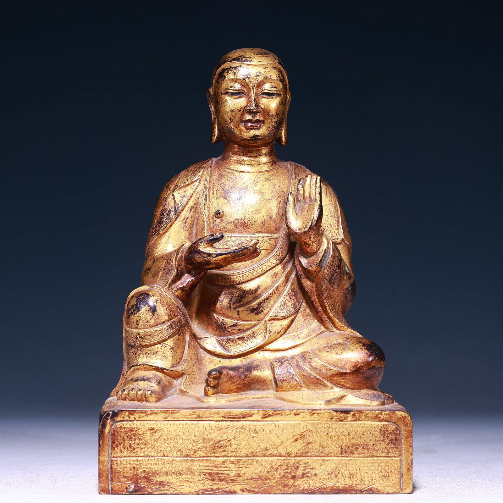 A Solemn Gilt Bronze Statue of Guru: A Solemn Gilt Bronze Statue of Guru,Qing Dynasty,China,Size:5.9inx4.7inx9.4in,Weight:3700g 铜鎏金上师像,中国清代