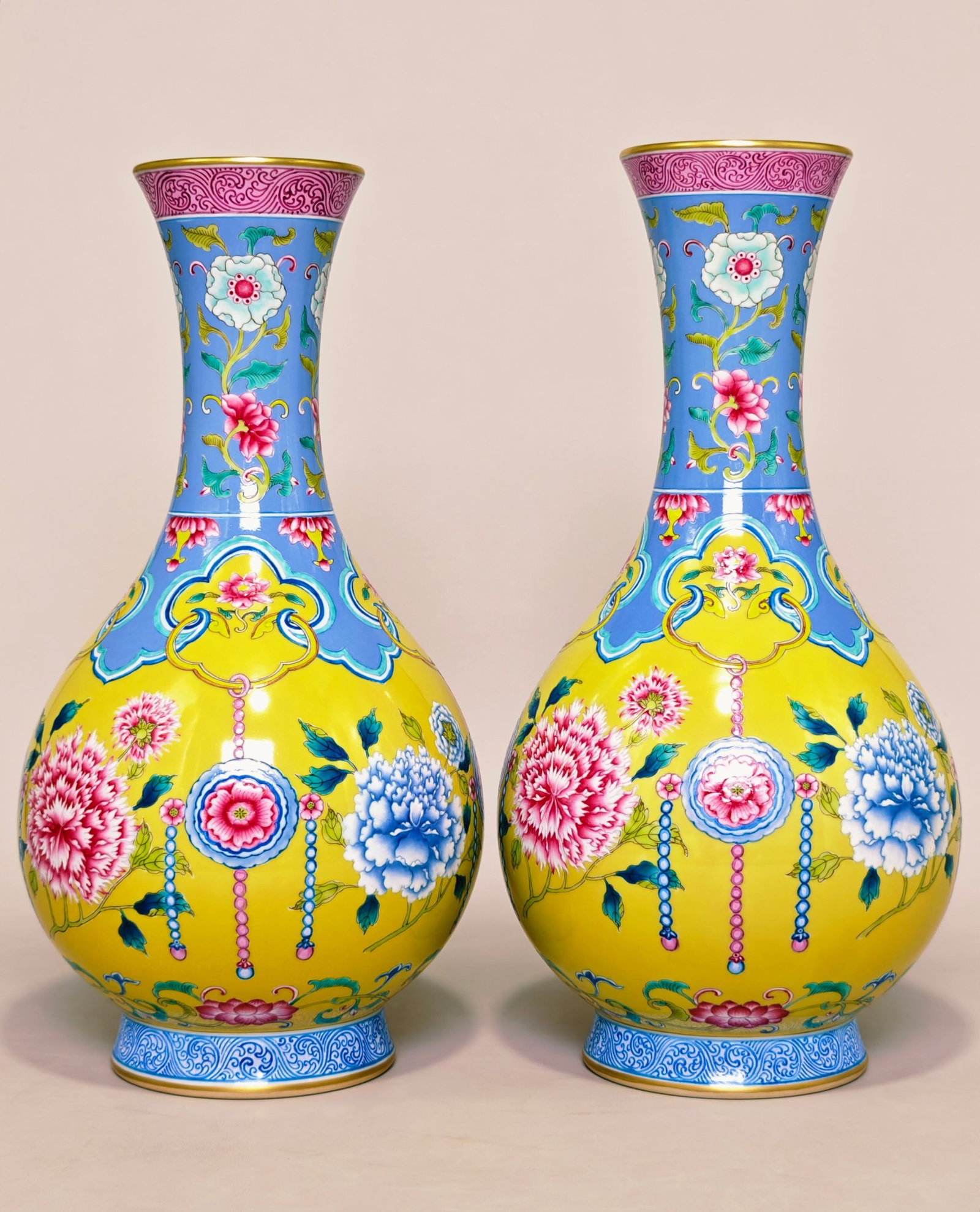 A Pair of Rare Yellow Ground Famille-Rose Painted Gold Flower Pattern Vases: A Pair of Rare Yellow Ground Famille-Rose Painted Gold Flower Pattern Vases,Qing Dynasty,China,Yongzheng Four-character Mark,Size:14.2inx7.5in 一对黄地粉彩描&