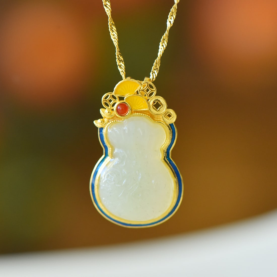 An Exquisite Sterling Silver-Gold Plated Inlaid White Jade Pendant: An Exquisite Sterling Silver-Gold Plated Inlaid White Jade Pendant,Size:7mmx9 102mm 纯银镀金镶白玉吊坠