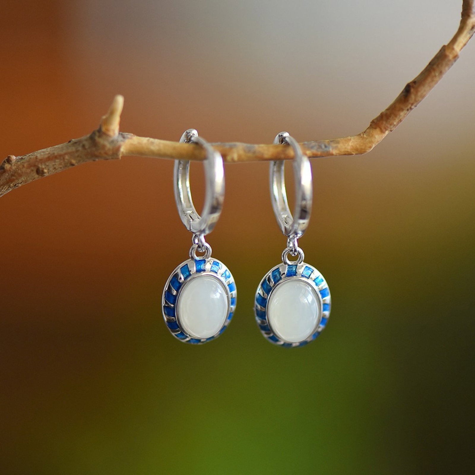 A Pair of Exquisite Sterling Silver Inlaid White Jade Earrings: A Pair of Exquisite Sterling Silver Inlaid White Jade Earrings 一对纯银镶白玉耳环