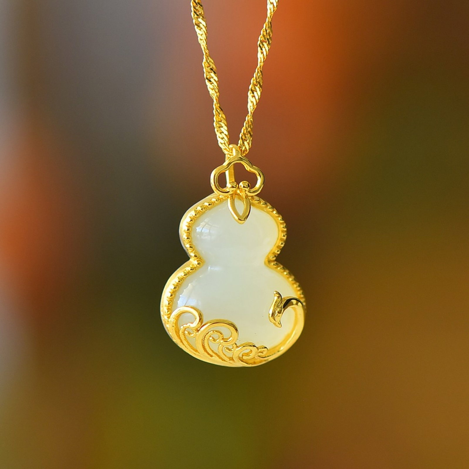 An Exquisite Sterling Silver-Gold Plated Inlaid White Jade Pendant: An Exquisite Sterling Silver-Gold Plated Inlaid White Jade Pendant 纯银镀金镶白玉吊坠