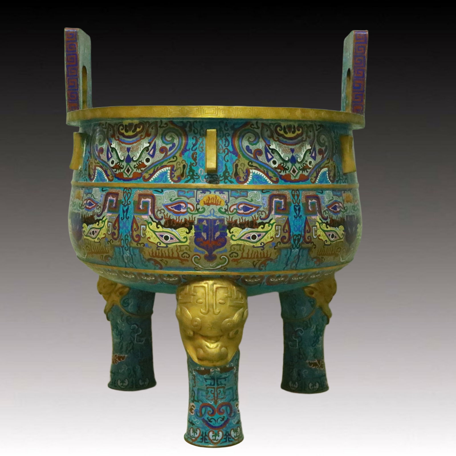 A Huge Cloisonne Beast-Face Pattern Double-Ears and Tripod Censer: A Huge Cloisonne Beast-Face Pattern Double-Ears and Tripod Censer,Qing Dynasty, China,Qianlong Four-character Mark,Size:28.3inx36.6in 景泰蓝兽面纹双耳&#