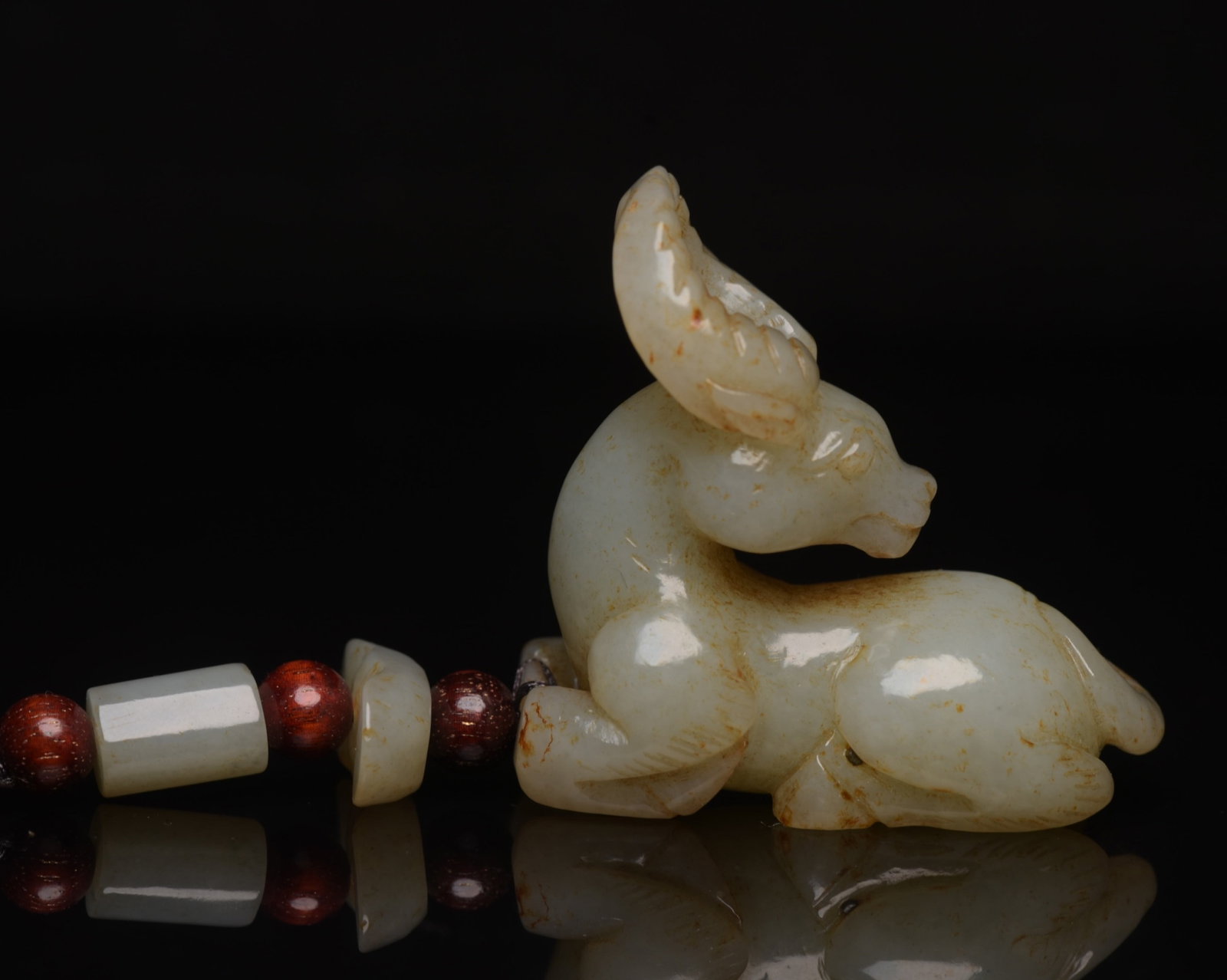 An Exquisite White Jade Buffalo Ornament: An Exquisite White Jade Buffalo Ornament,Qing Dynasty,China,Size:2.1inx2inx1in,Weight:68g 白玉牛摆件,中国清代