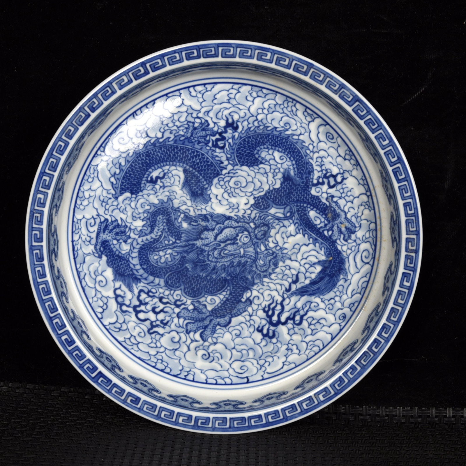 An Exquisite Blue and White Auspicious Cloud and Dragon Pattern Plate: An Exquisite Blue and White Auspicious Cloud and Dragon Pattern Plate,Qing Dynasty,China,Yongzheng Six-character Mark,Size:1.3inx7.2in 青花祥云龙纹盘子,