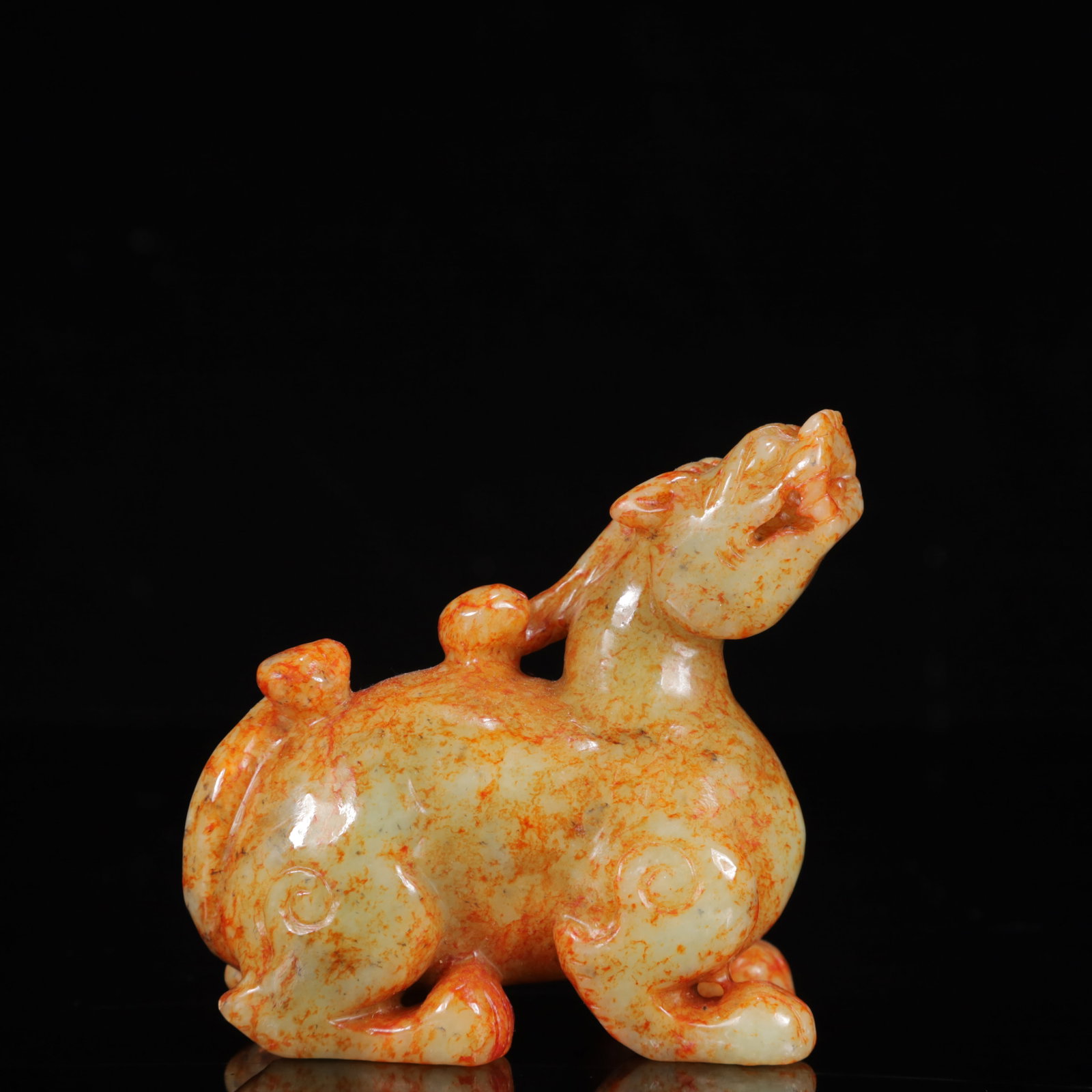 An Exquisite White Jade Auspicious Beast Ornament: An Exquisite White Jade Auspicious Beast Ornament,Qing Dynasty,China,Size:3.5inx1.6inx3.1in,Weight:344g 白玉瑞兽摆件,中国清代