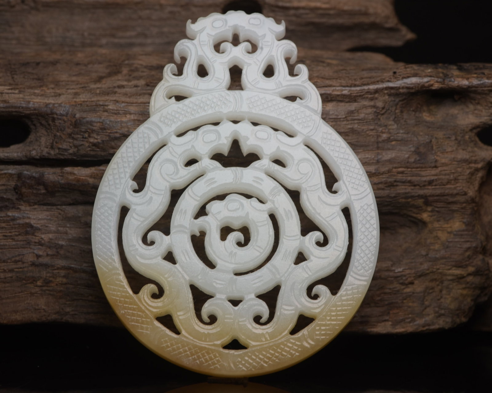An Exquisite White Jade Chi-Dragon Pattern Pendant (1 of 9)