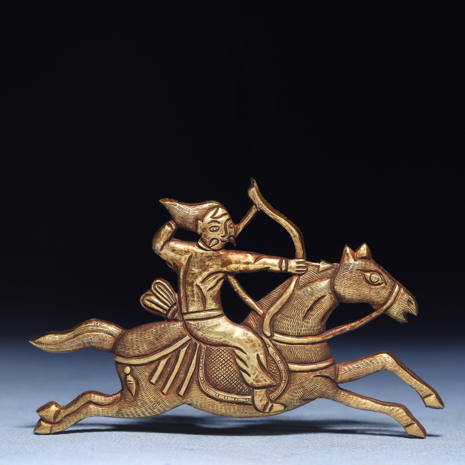 An Exquisite Gilt Silver Figure Riding Horse Ornament: An Exquisite Gilt Silver Figure Riding Horse Ornament,Qing Dynasty,China,Size:3.3inx2in,Weight:29.8g 银鎏金人物骑马摆件,中国清&#
