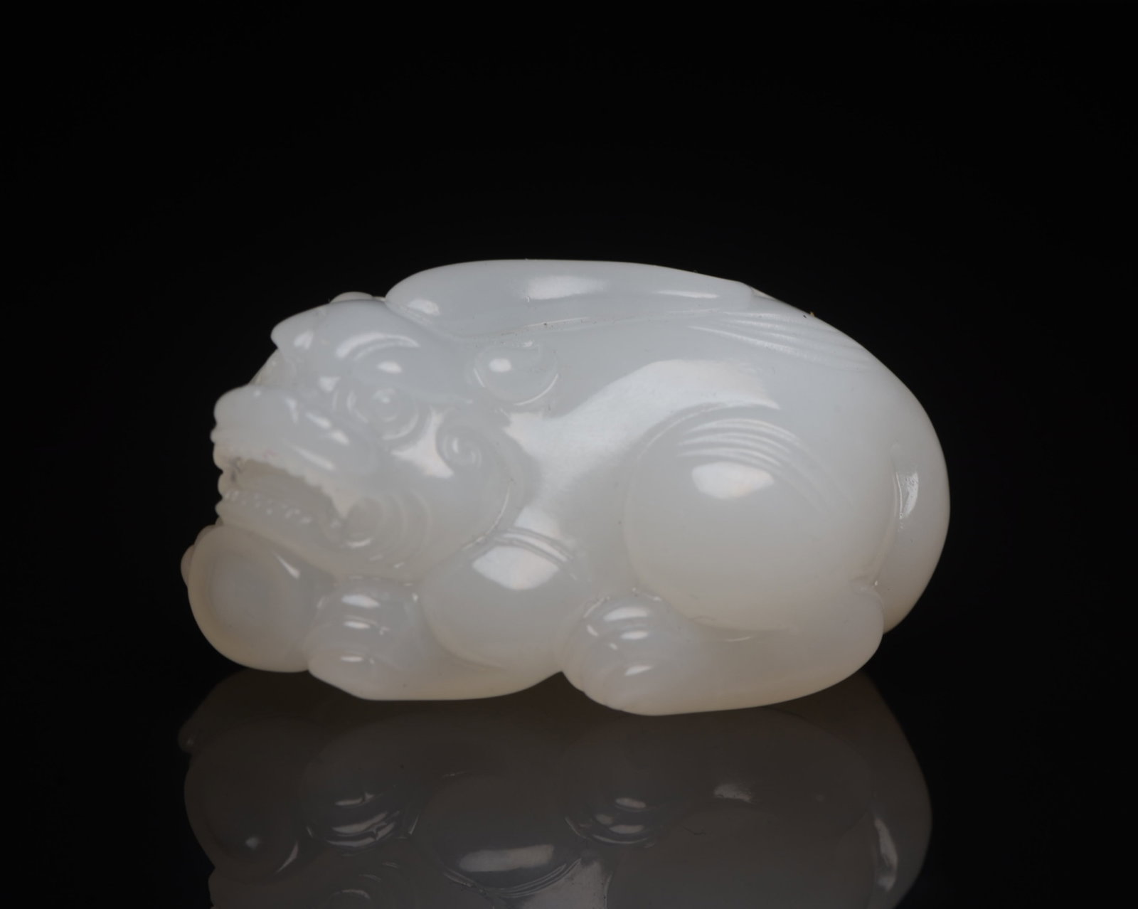 An Exquisite White Jade Wealth-Attracting Creature Ornament (1 of 9)