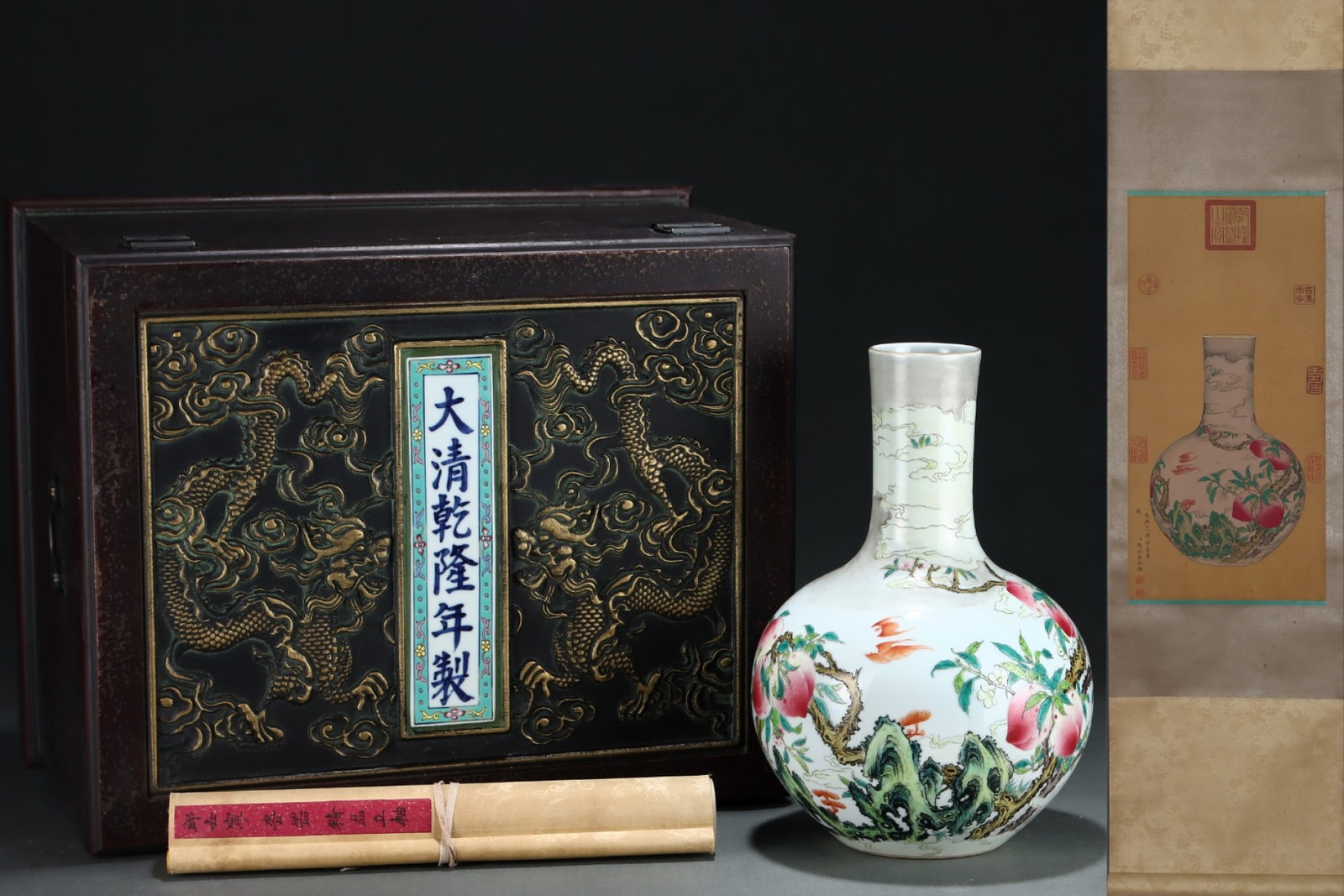 A Rare Famille-Rose Painted Gold Bats and Peach Pattern Vase,with Chinese Vertical Scroll Ink: A Rare Famille-Rose Painted Gold Bats and Peach Pattern Vase,with Chinese Vertical Scroll Ink Painting on Silk,Qing Dynasty,China,Qianlong Six-character Mark,Size:(Porcelain)13.3inx9.3in,(Without fram