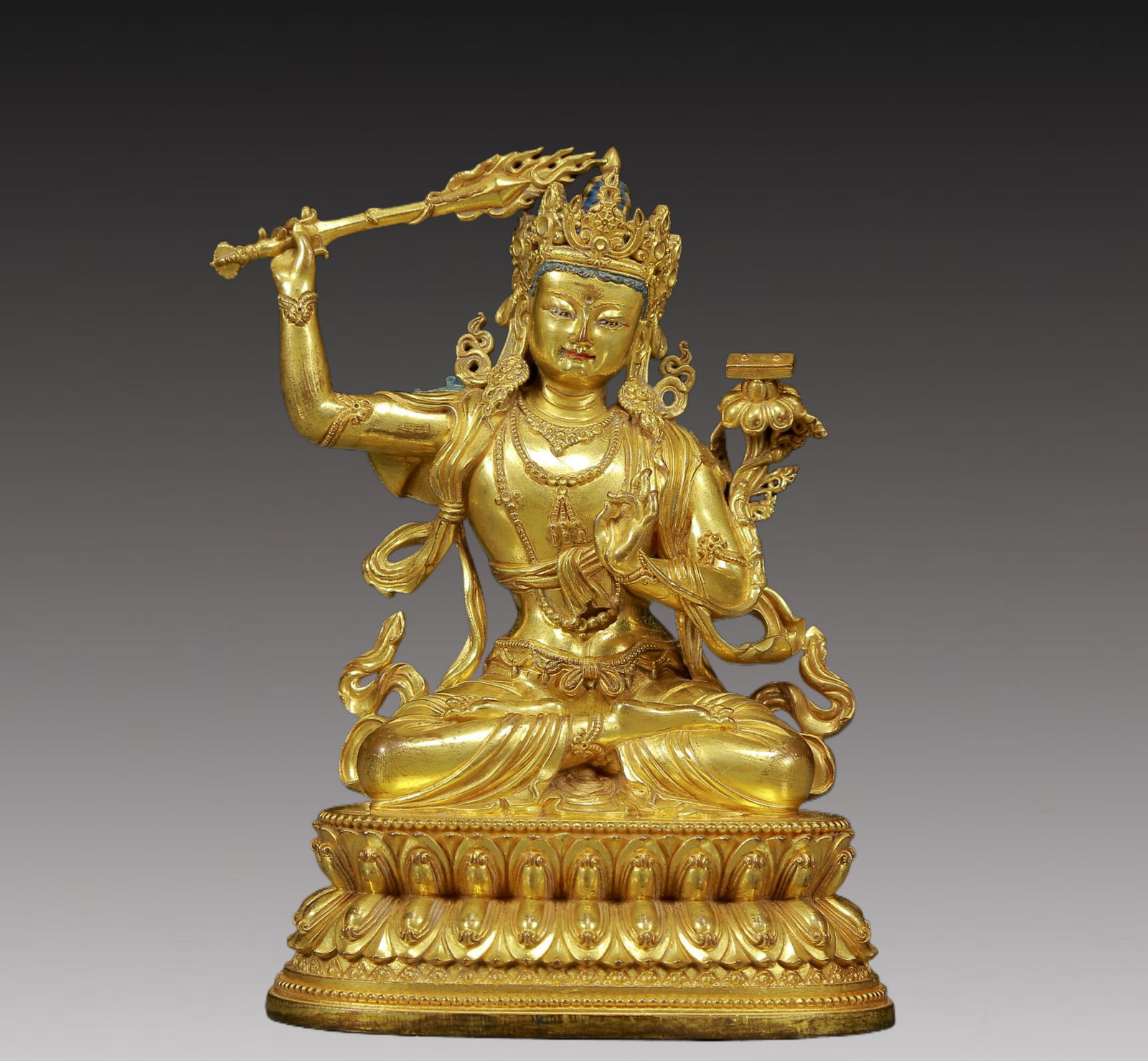 A Solemn Gilt Bronze Statue of Manjusri: A Solemn Gilt Bronze Statue of Manjusri,Ming Dynasty, China,Size:4.3inx3inx5.9in,Weight:865g 铜鎏金文殊菩萨像，明代