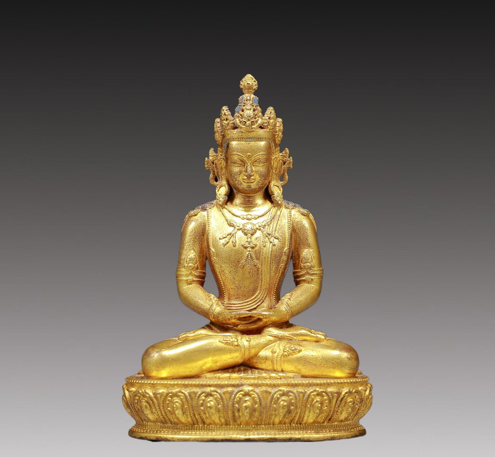 A Solemn Gilt Bronze Statue of Amitayus: A Solemn Gilt Bronze Statue of Amitayus,Ming Dynasty, China,Size:2.8inx2inx3.9in,Weight:240g 铜鎏金无量寿佛像，明代