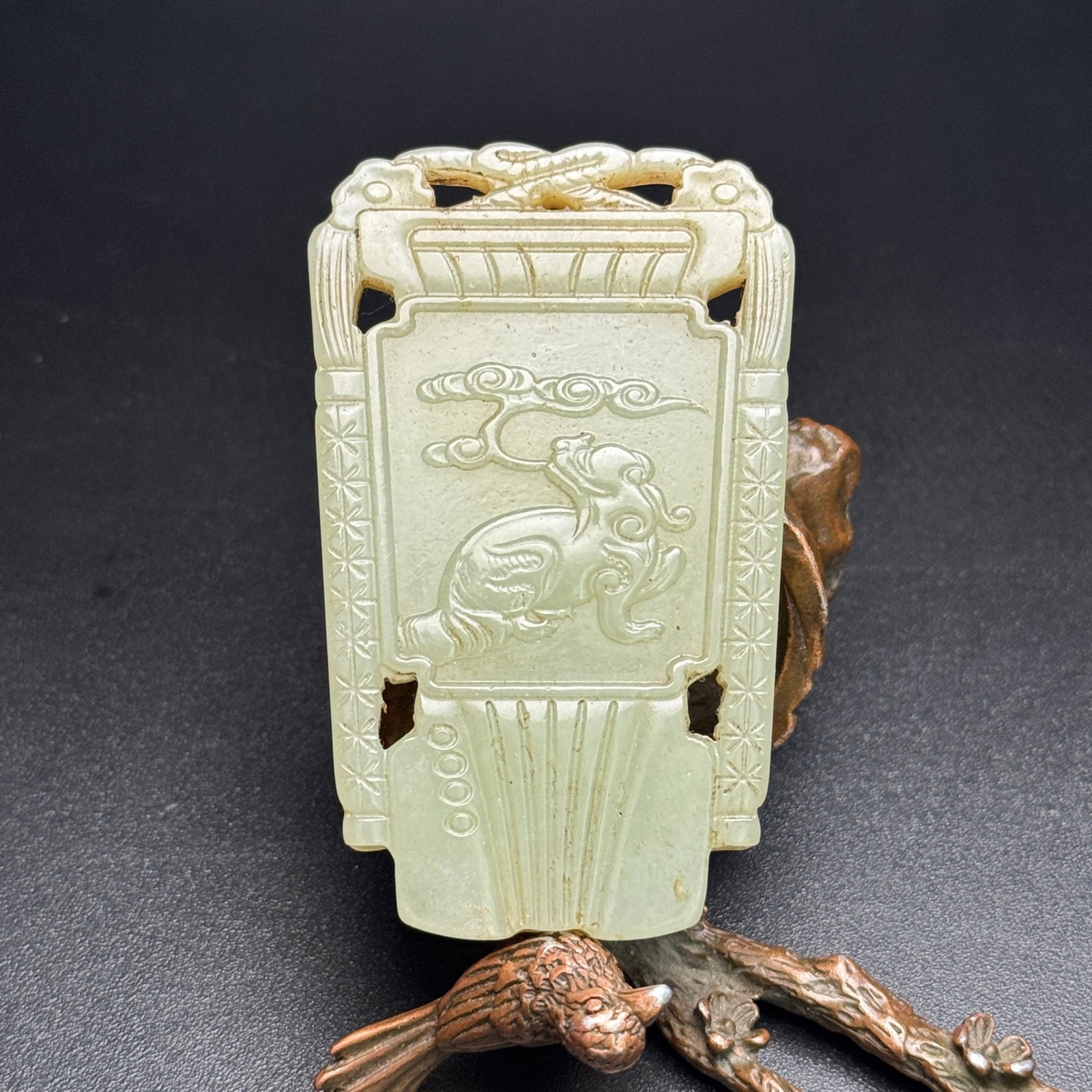An Exquisite White Jade Beast Pattern Pendant: An Exquisite White Jade Beast Pattern Pendant,Qing Dynasty,China,Size:44mmx72mmx6mm,Weight:47g 白玉兽纹牌,中国清代