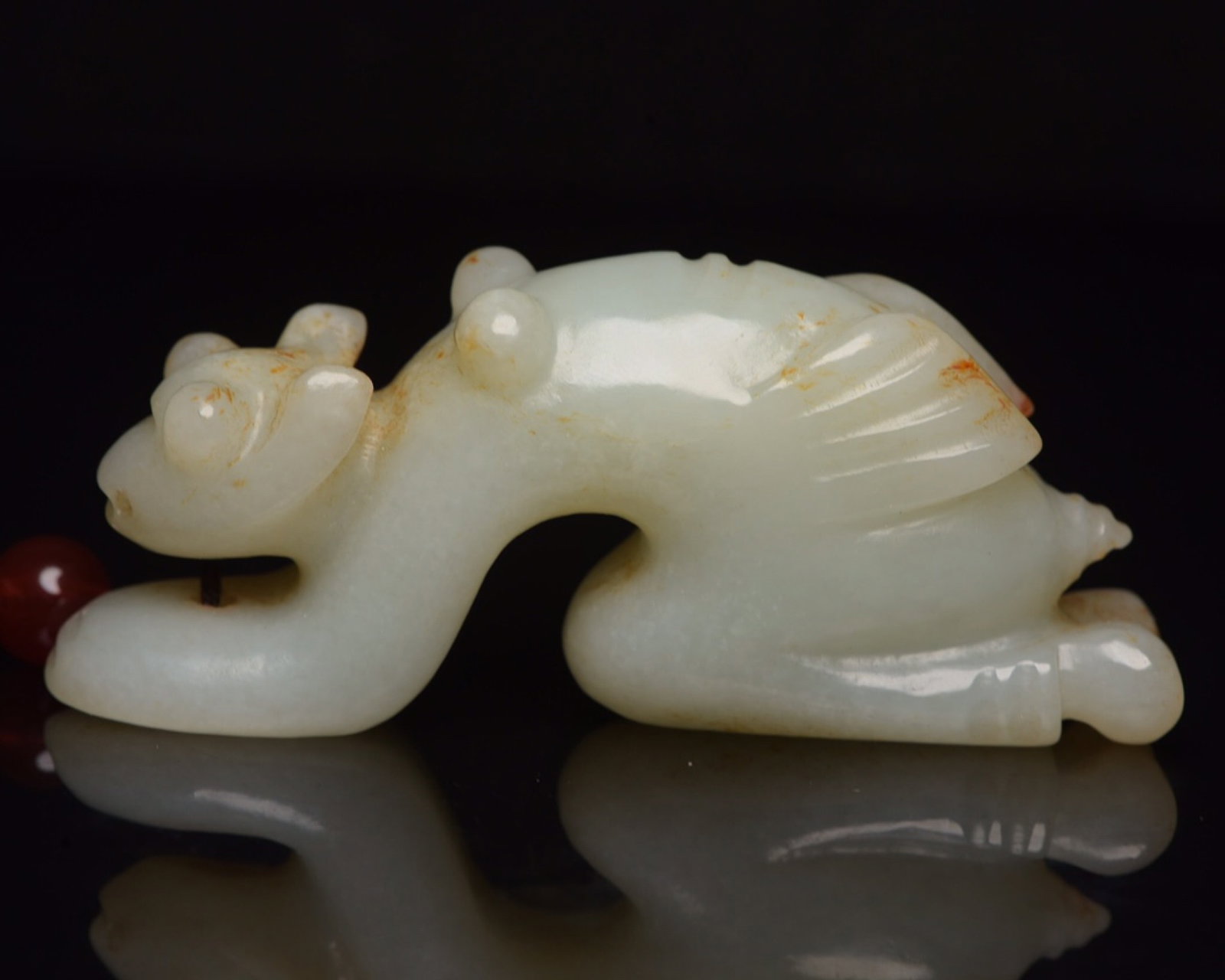 An Exquisite White Jade Beast Ornament: An Exquisite White Jade Beast Ornament,Qing Dynasty,China,Size:3.3inx1.4inx0.8in,Weight:98g 白玉兽摆件,中国清代