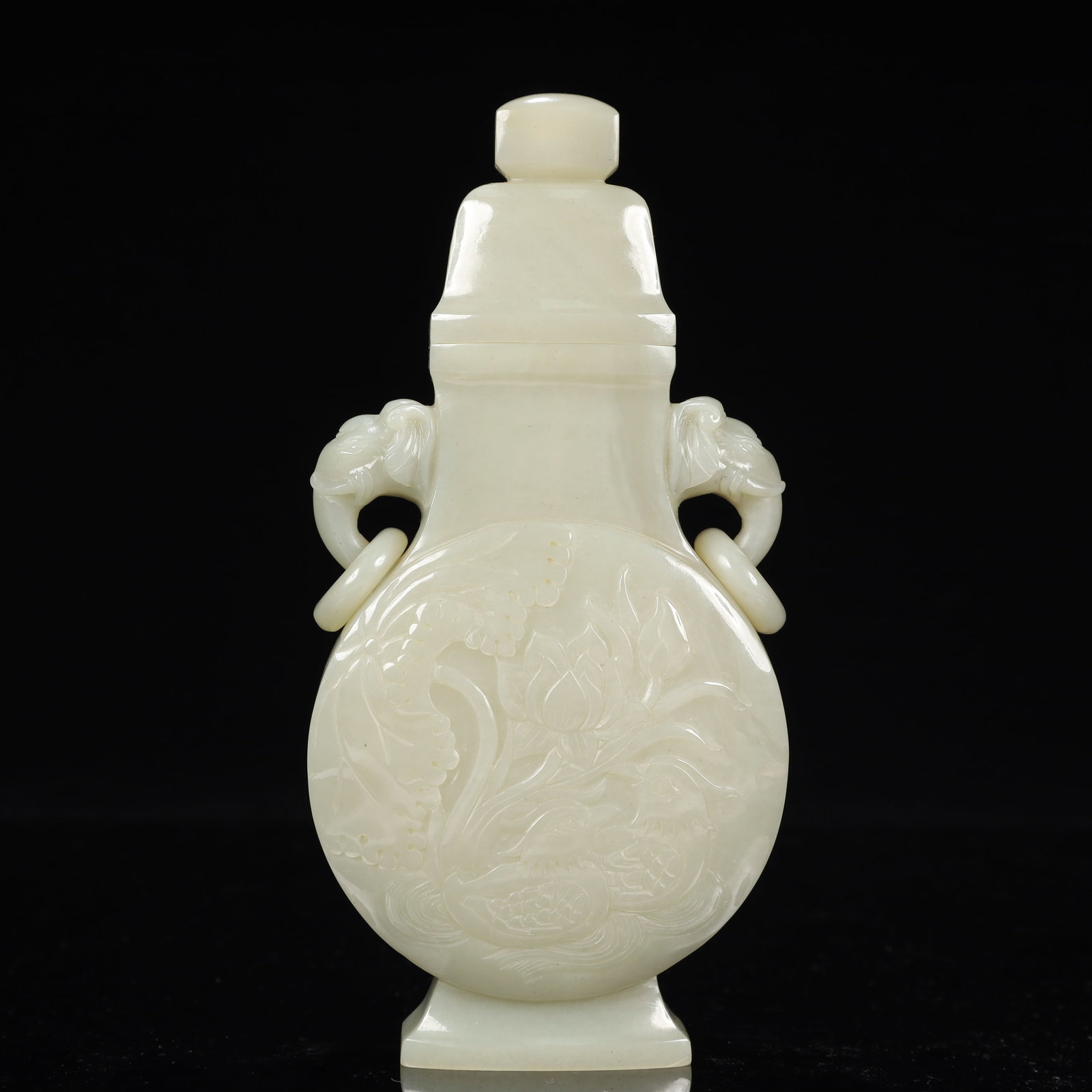 An Exquisite White Jade Flower and Bird Pattern Elephant-Ears Bottle: An Exquisite White Jade Flower and Bird Pattern Elephant-Ears Bottle,Qing Dynasty, China,Size:3.5inx1.2inx7.1in,Weight:300g 白玉花鸟纹象耳盖瓶,