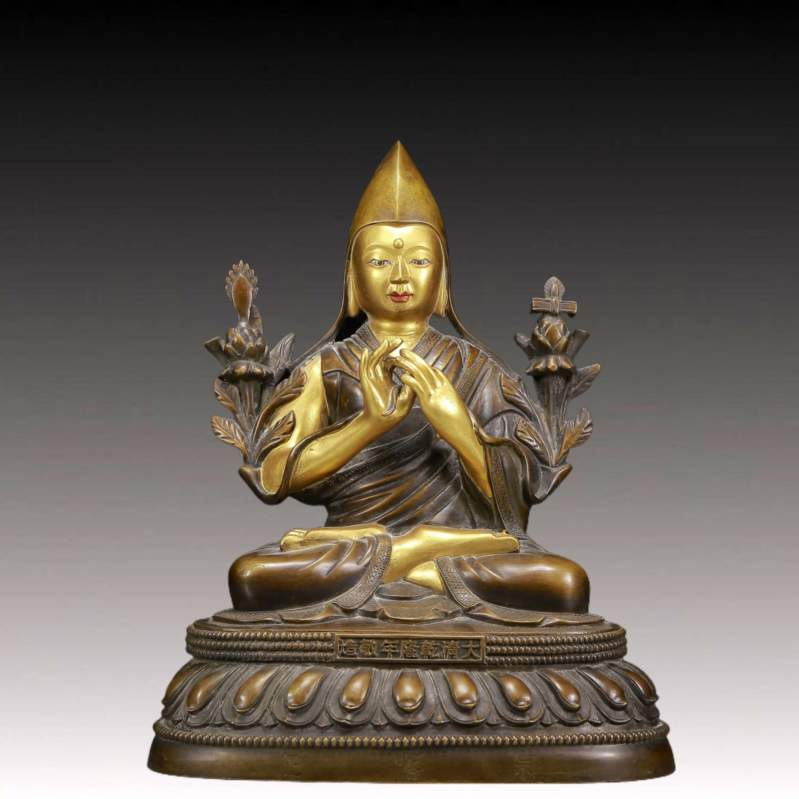A Solemn Gilt Bronze Statue of Tsongkhapa: A Solemn Gilt Bronze Statue of Tsongkhapa,Qing Dynasty, China,Qianlong Seven-character Mark,Size:10.6inx7.9inx14.2in,Weight:9430g 铜鎏金宗喀巴像，଀