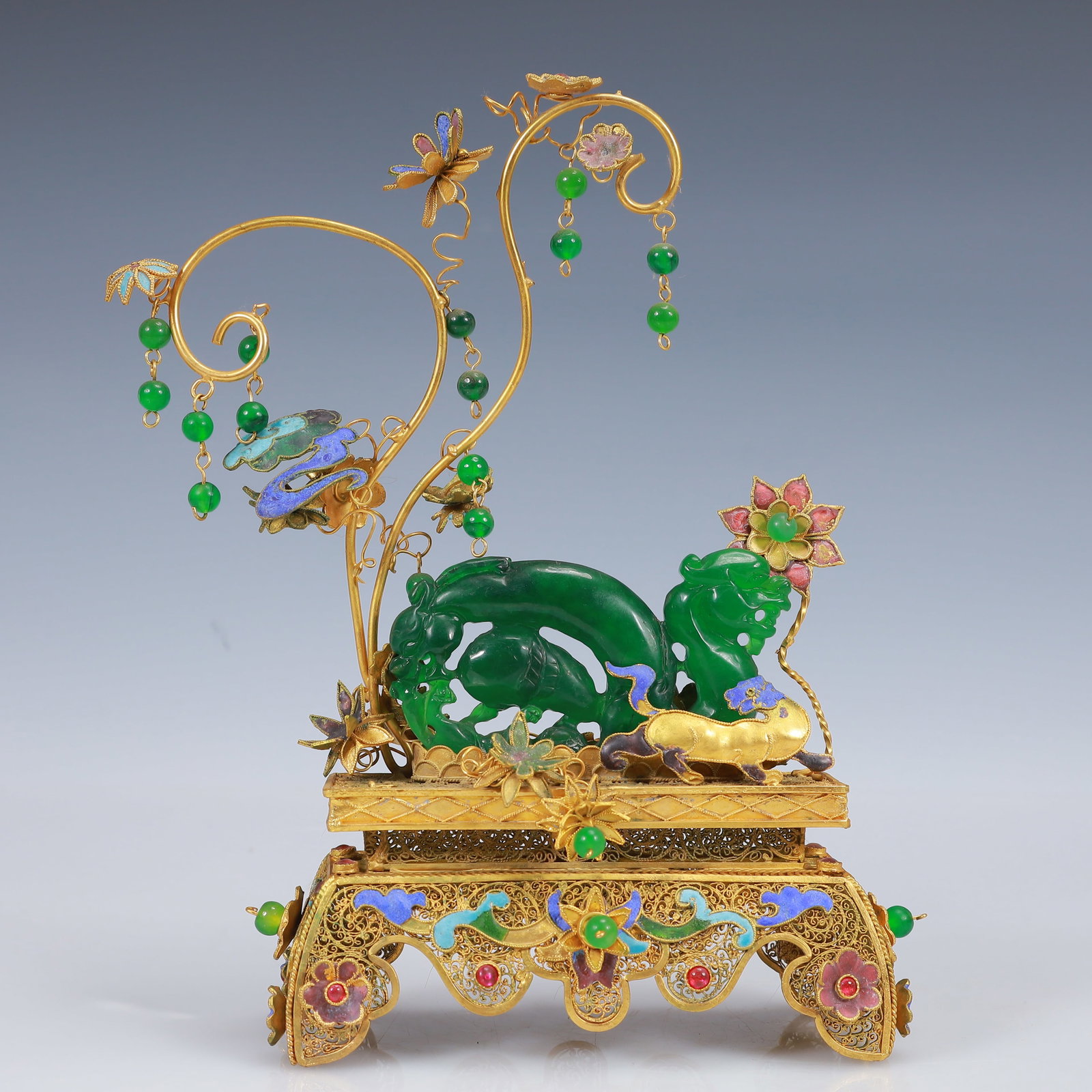 An Exquisite Filigree and Gilding Inlaid Jadeite Dragon Ornament,Inlaid Gems: An Exquisite Filigree and Gilding Inlaid Jadeite Dragon Ornament,Inlaid Gems,Qing Dynasty, China,Qianlong Four-Character Mark,Size:5.9inx2.8inx9.8in,Weight:507g 花丝鎏金嵌