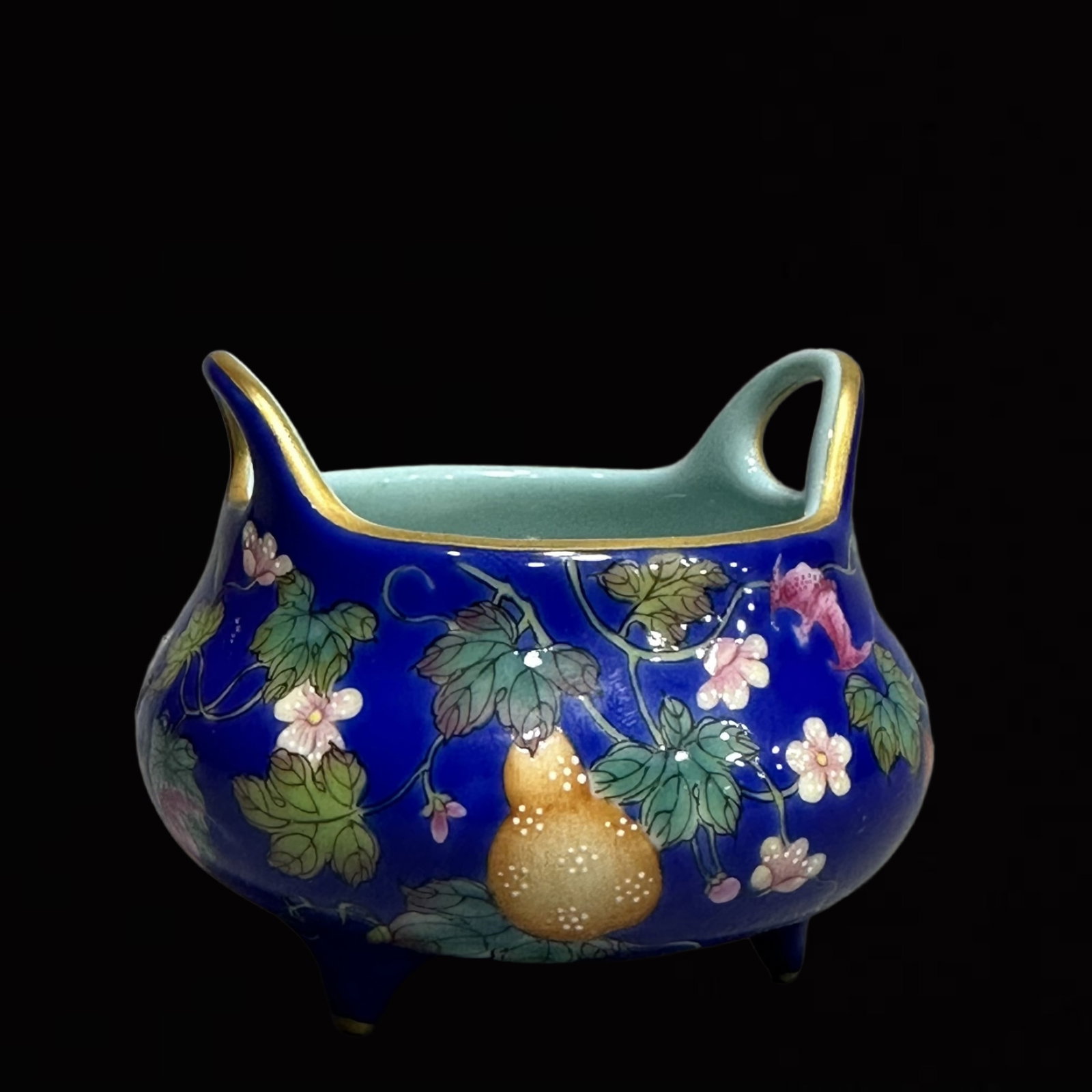 An Exquisite Sapphire Blue Glazed Gourd Pattern Double-Ears and Tripod Censer: An Exquisite Sapphire Blue Glazed Gourd Pattern Double-Ears and Tripod Censer,Qing Dynasty,China,Qianlong Four-Character Mark,Size:2inx6.cm 宝石蓝釉葫芦纹