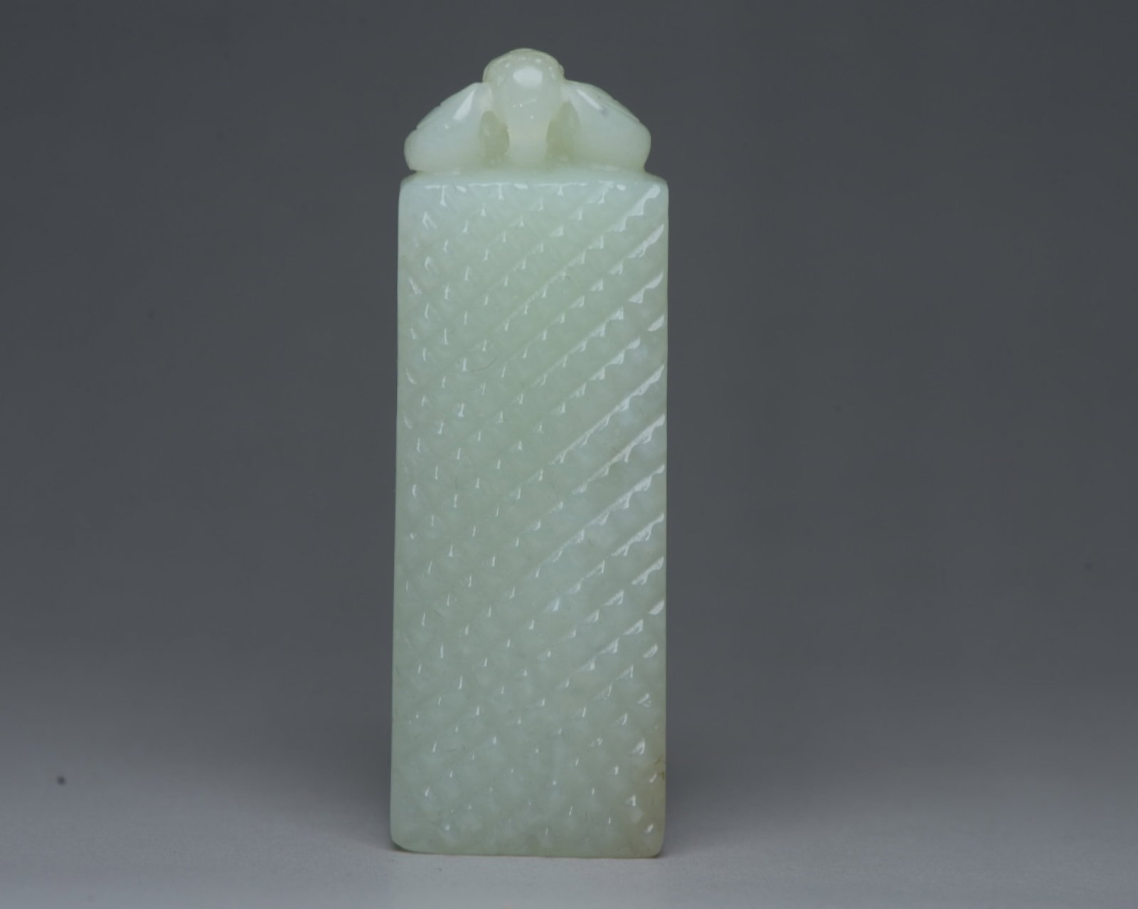 An Exquisite White Jade Seal: An Exquisite White Jade Seal,Qing Dynasty,China,Size:2.9inx1inx0.6in,Weight:71g 白玉印章,中国清代