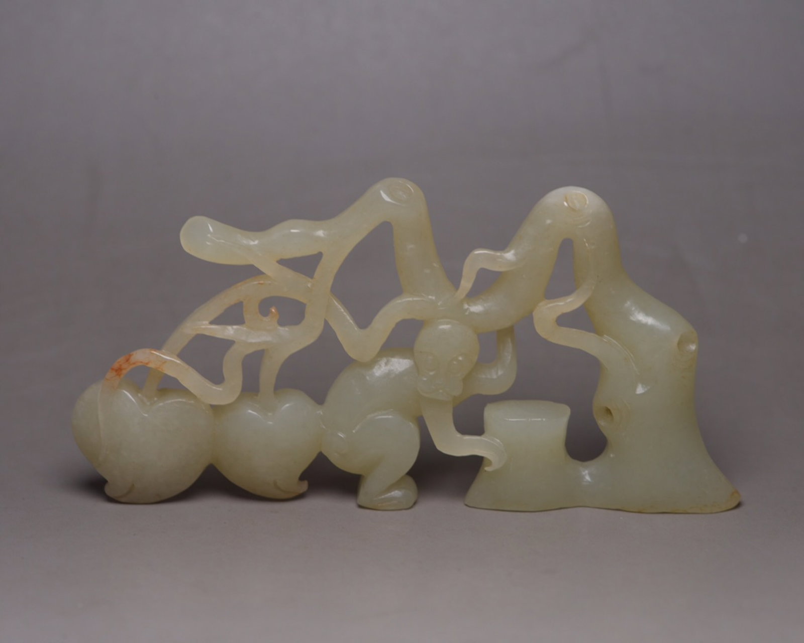 An Exquisite White Jade Monkey Ornament: An Exquisite White Jade Monkey Ornament,Qing Dynasty,China,Size:3.9inx1.9inx0.4in,Weight:50g 白玉猴子摆件,中国清代