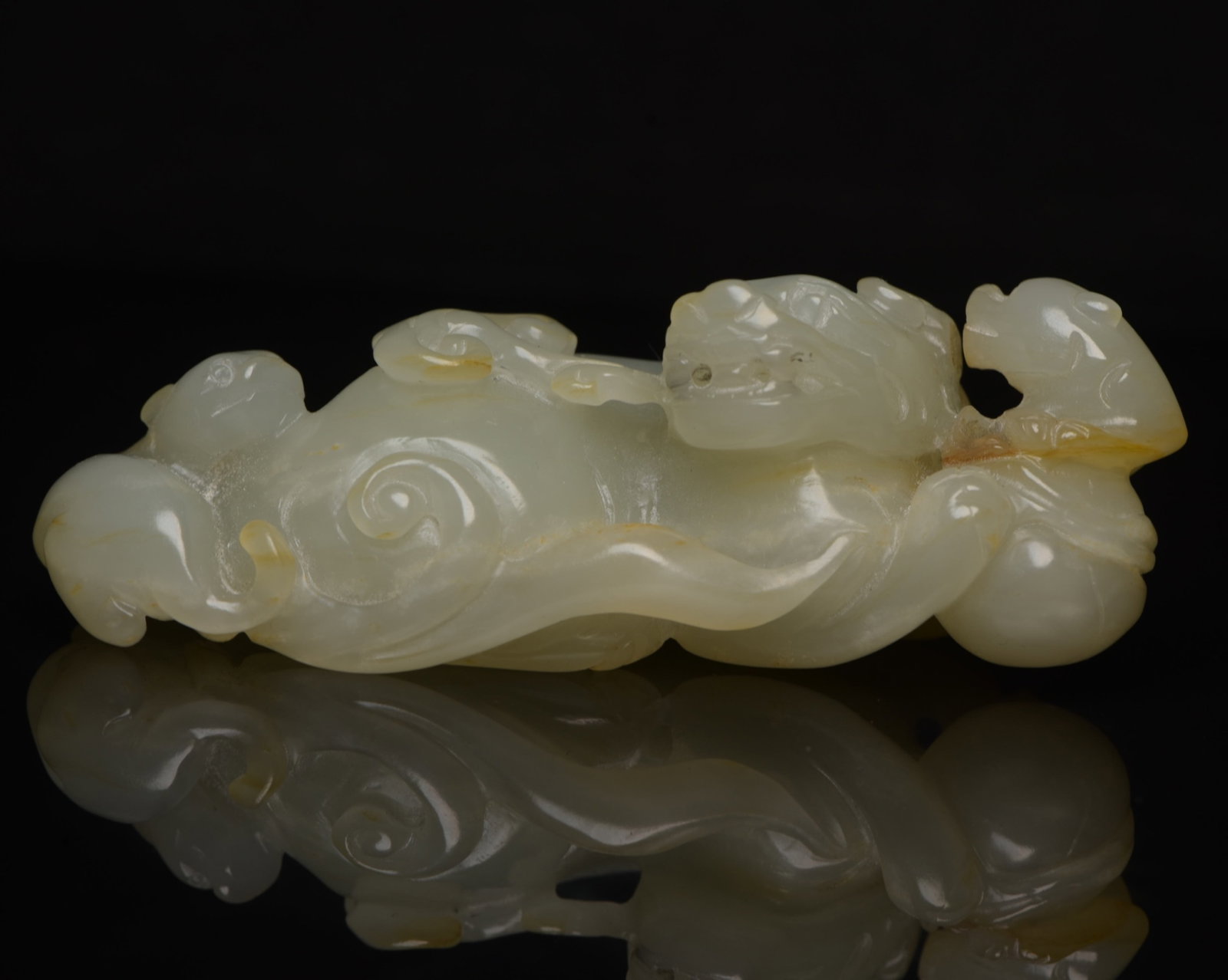 An Exquisite White Jade Lion Ornament: An Exquisite White Jade Lion Ornament,Qing Dynasty,China,Size:4.3inx1.8inx1.5in,Weight:210g 白玉狮子摆件,中国清代