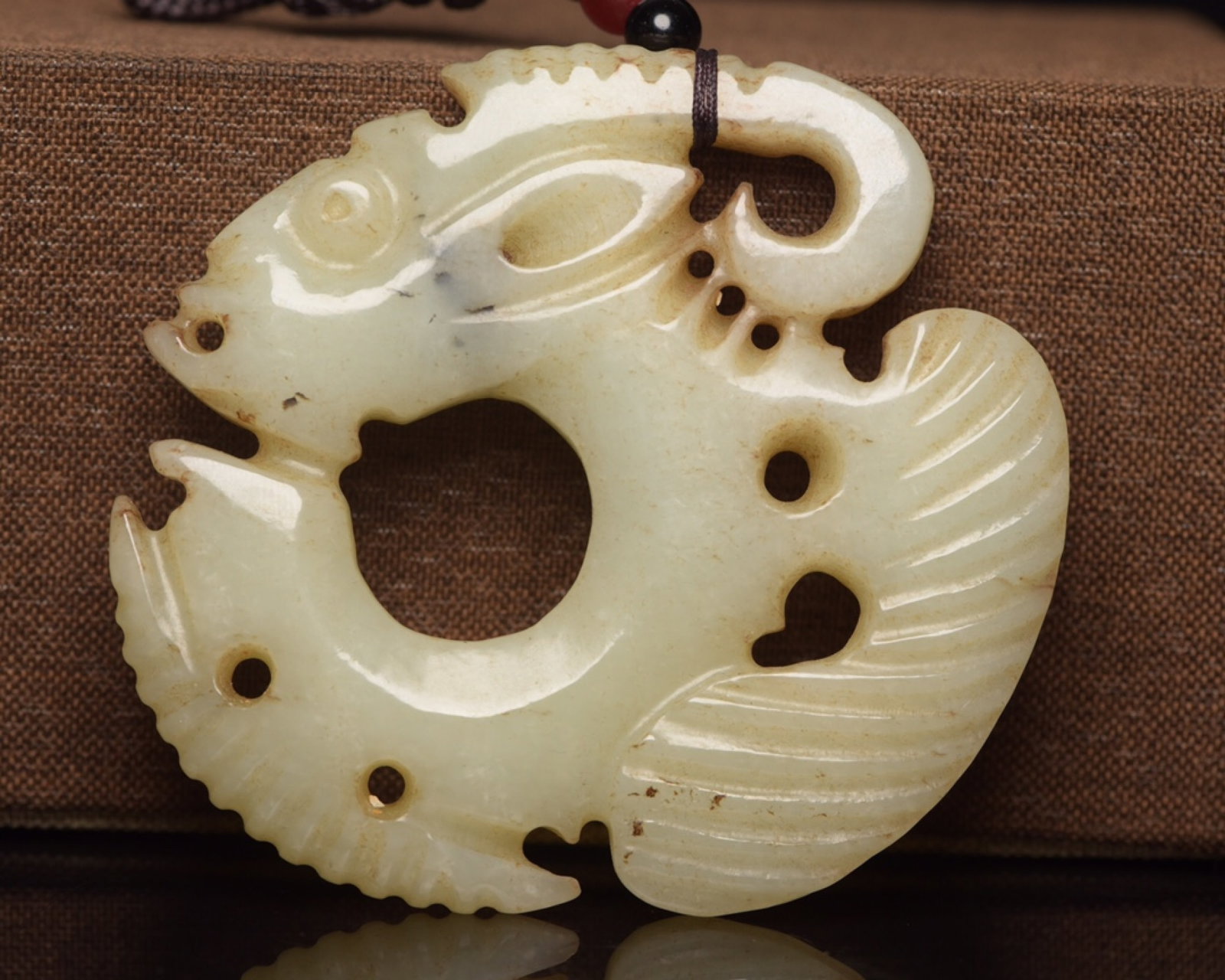 An Exquisite White Jade Pig and Dragon Pendant: An Exquisite White Jade Pig and Dragon Pendant,Qing Dynasty,China,Size:3.1inx2.9inx0.5in,Weight:111g 白玉猪龙挂件,中国清代