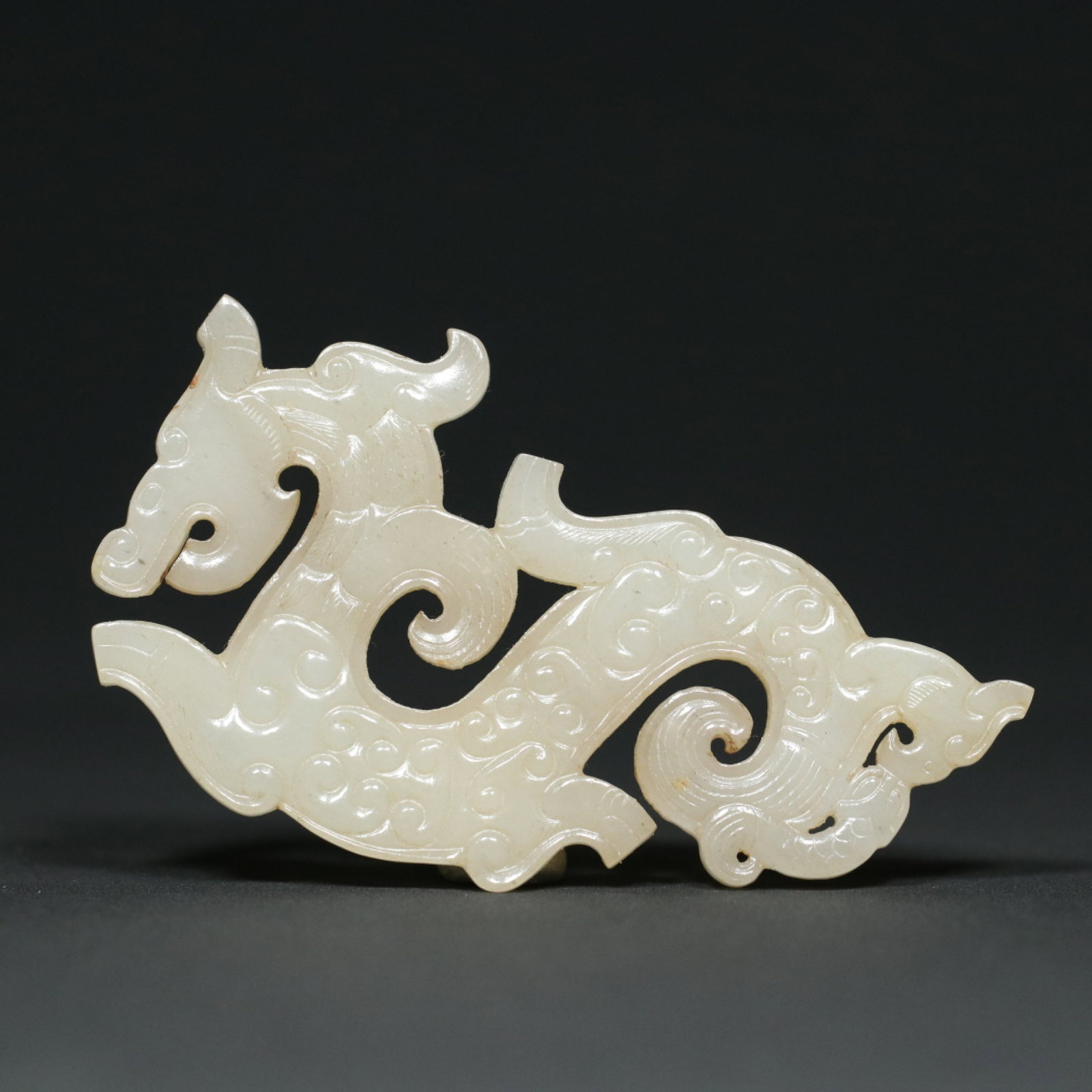 An Exquisite White Jade Dragon Pattern Ornament: An Exquisite White Jade Dragon Pattern Ornament,Han Dynasty,China,Size:3.6inx2.1inx0.2in,Weight:45.2g 白玉龙纹摆件,中国汉代