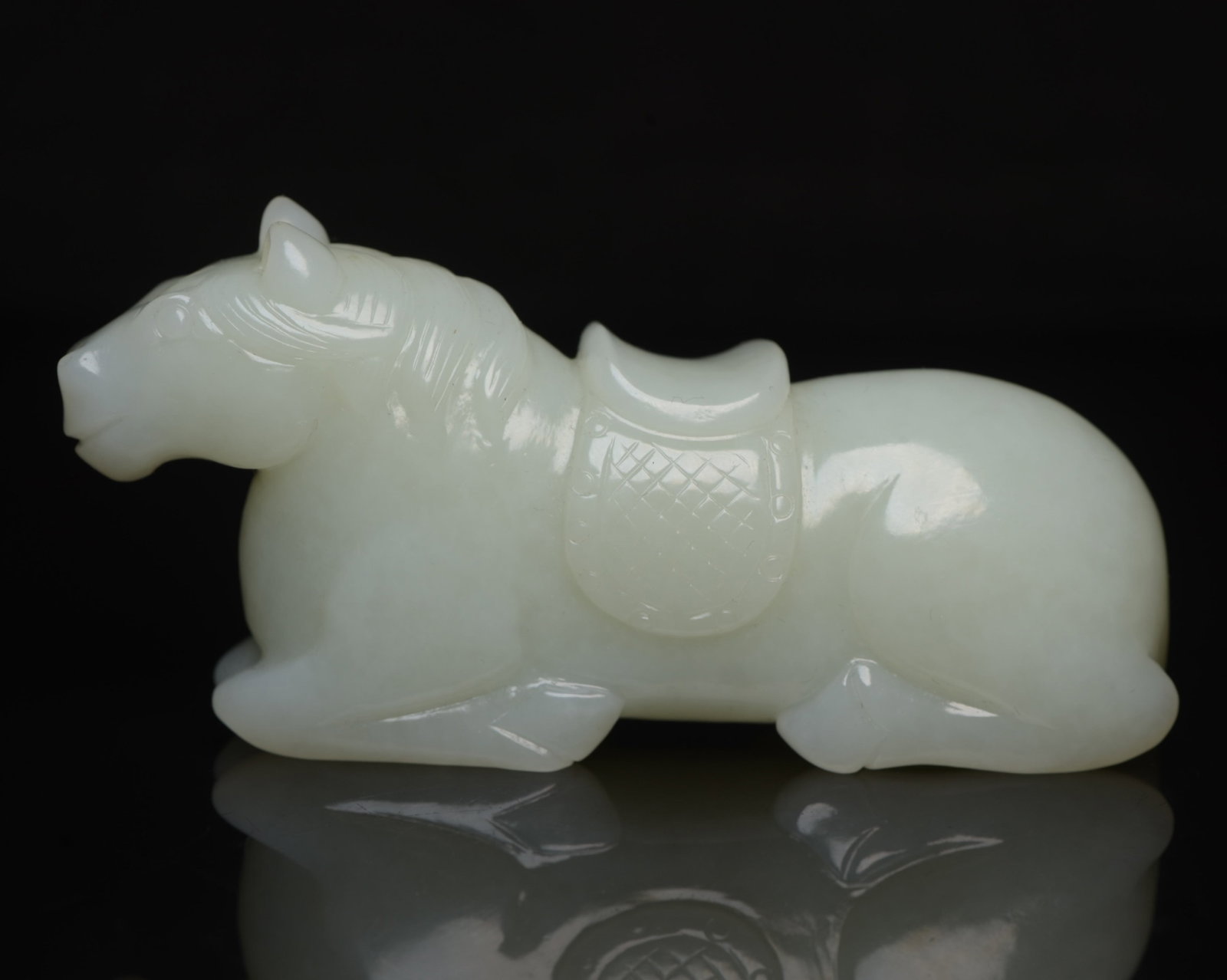 An Exquisite White Jade Horse Ornament: An Exquisite White Jade Horse Ornament,Qing Dynasty,China,Size:3.7inx1.7inx1.1in,Weight:143g 白玉骏马摆件,中国清代