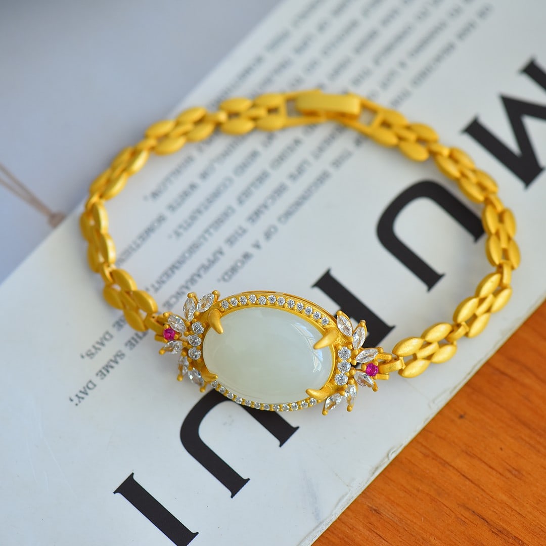An Exquisite Sterling Silver-Gold Plated Inlaid White Jade Bracelet,Inlaid Diamond: An Exquisite Sterling Silver-Gold Plated Inlaid White Jade Bracelet,Inlaid Diamond,Size:15mmx20mm 纯银镀金镶白玉手镯,嵌钻石