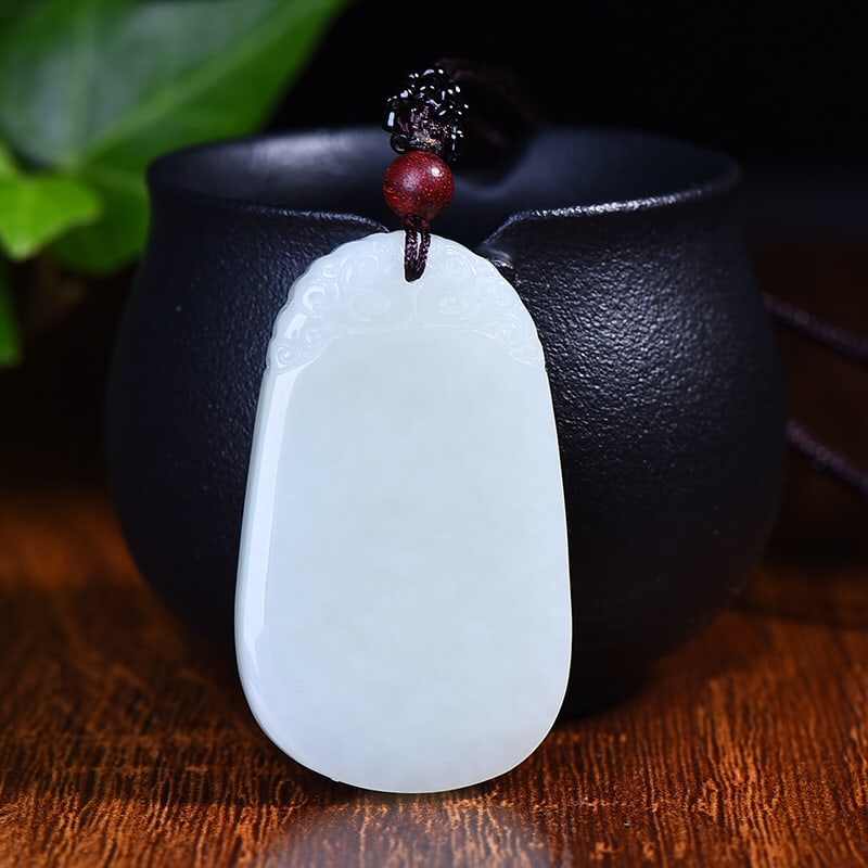 An Exquisite White Jade Pendant: An Exquisite White Jade Pendant,Size:49mmx31mm 白玉挂件