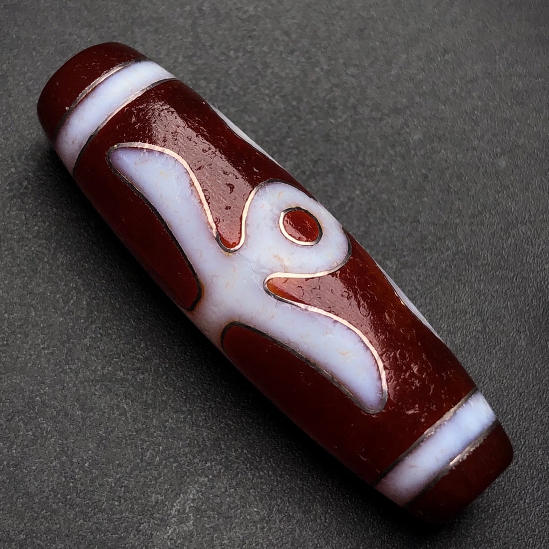 An Exquisite Dzi Bead Inlaid Silver Pendant: An Exquisite Dzi Bead Inlaid Silver Pendant,Size:49mmx14mm,Weight:16.6g 天珠嵌银挂件