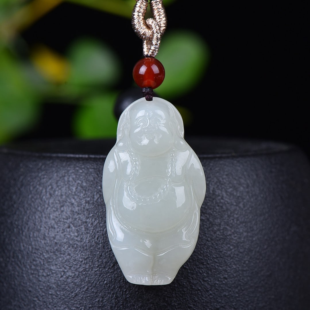 An Exquisite White Jade Buddha Statue Pendant: An Exquisite White Jade Buddha Statue Pendant,Size:19mmx35mm 白玉佛像挂件