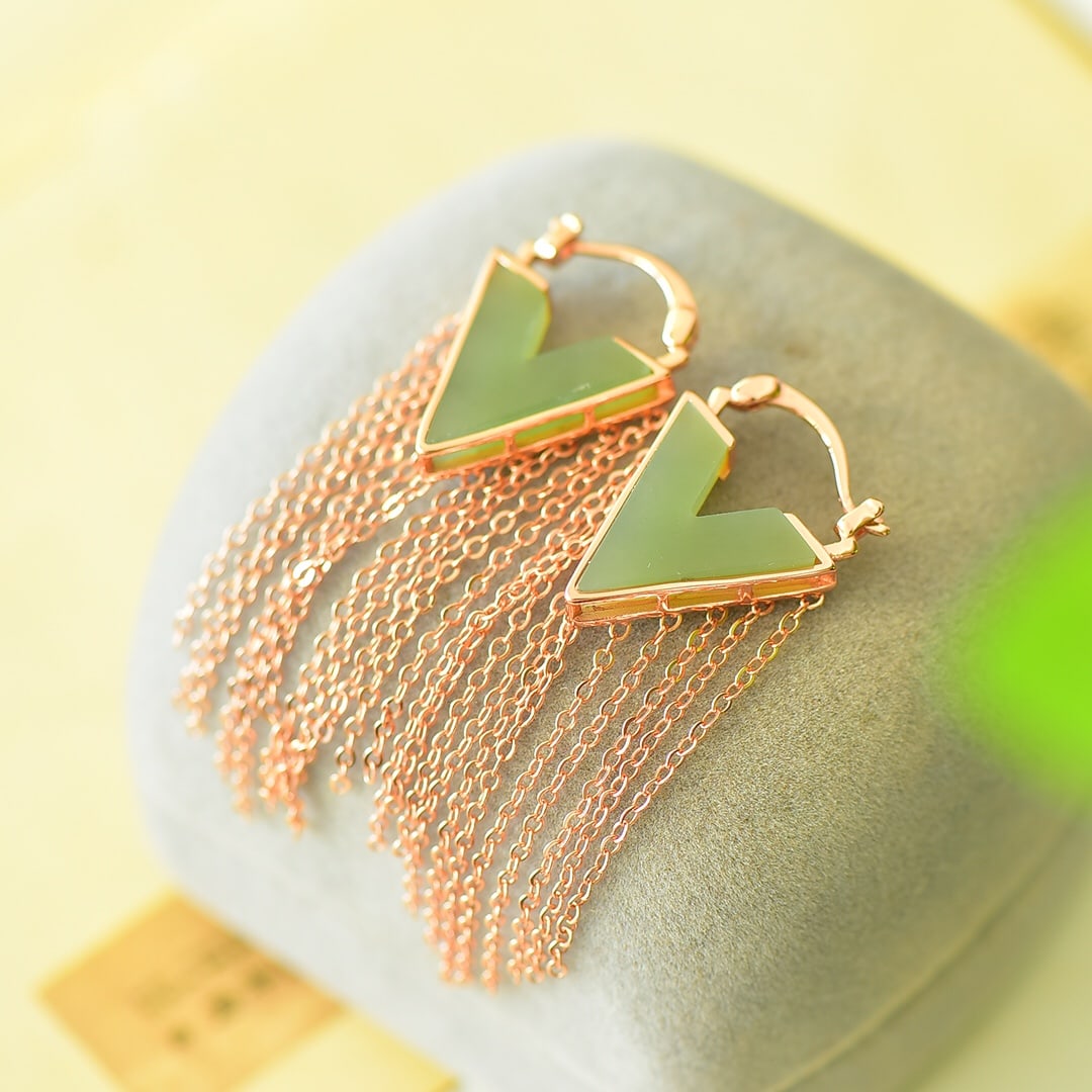 A Pair of Exquisite Sterling Silver-Gold Plated Inlaid Green Jade Earrings: A Pair of Exquisite Sterling Silver-Gold Plated Inlaid Green Jade Earrings,Size:17mmx60mm 一对纯银镀金镶青玉耳环