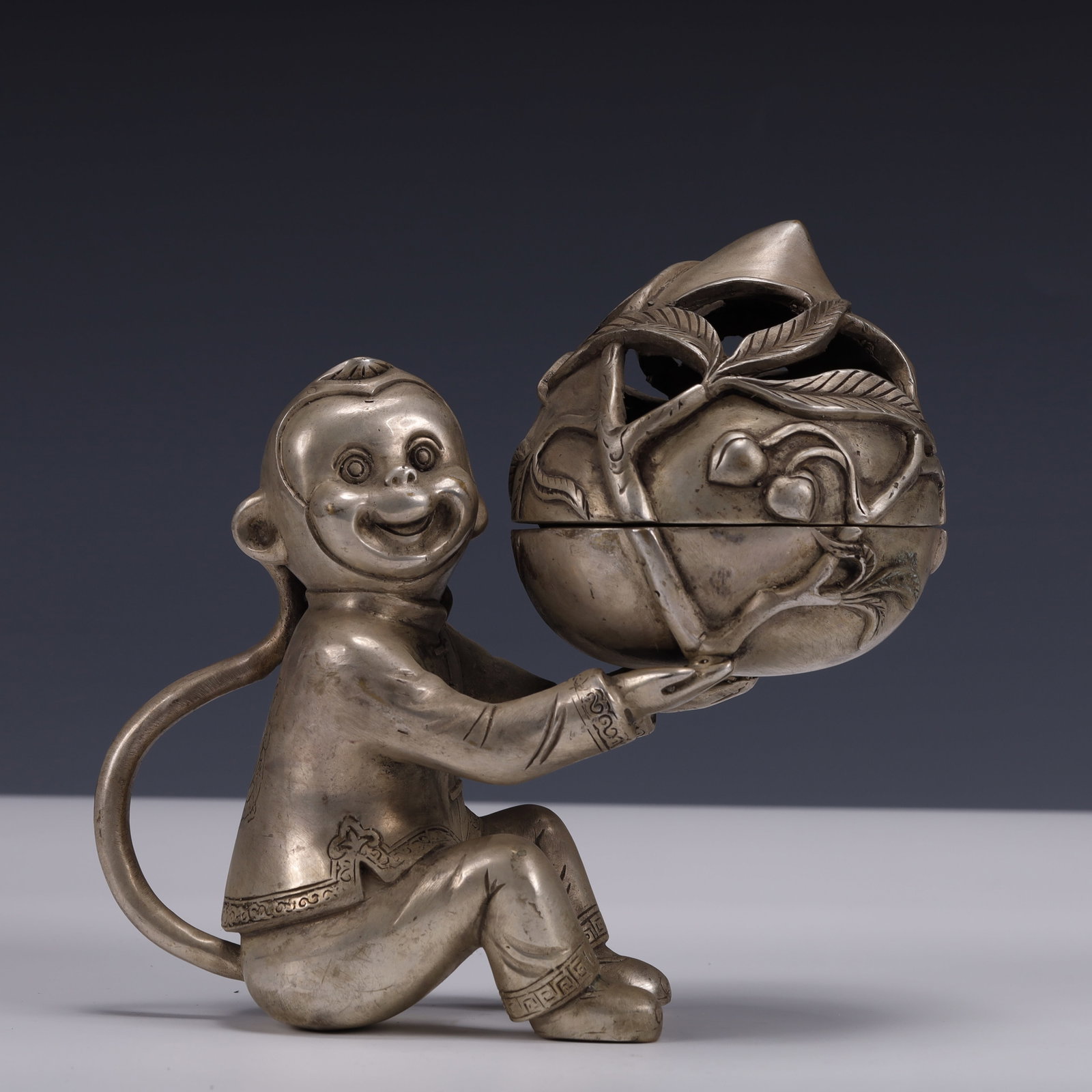 An Exquisite Silver-Plated Bronze Monkey Censer: An Exquisite Silver-Plated Bronze Monkey Censer ,The Republic of China,Size:7.1inx3.5inx7.1in,Weight:1300g 铜镀银猴子香炉,中国民国