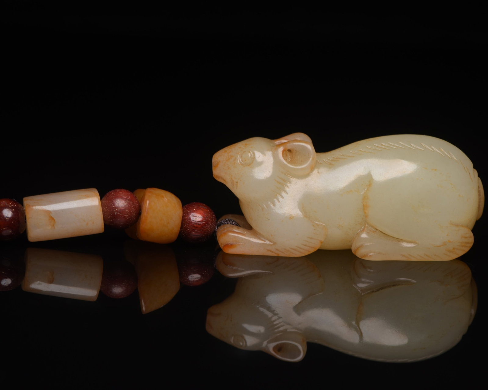 An Exquisite White Jade Mouse Ornament (1 of 9)