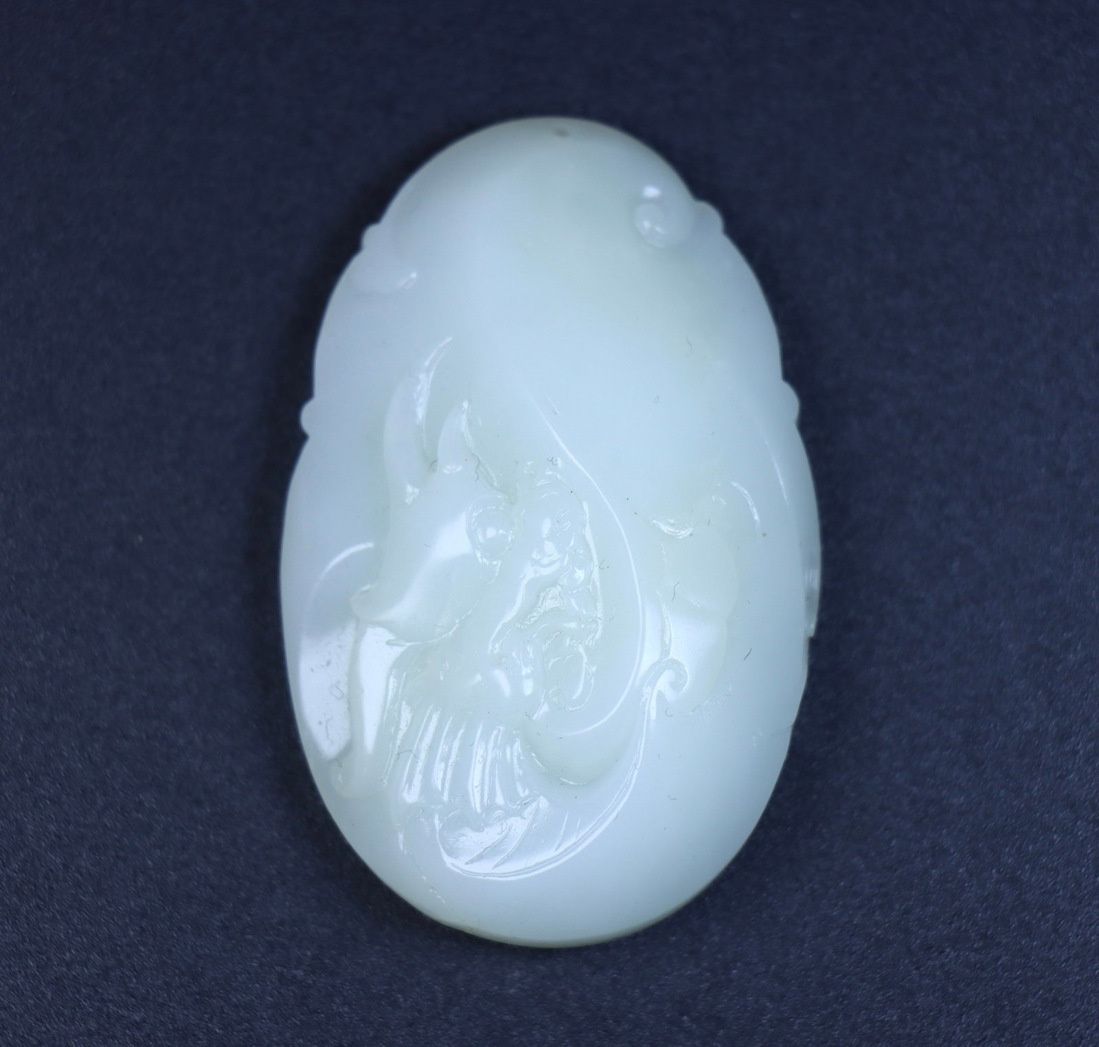 An Exquisite White Jade Dragon Pattern Pendant (1 of 9)