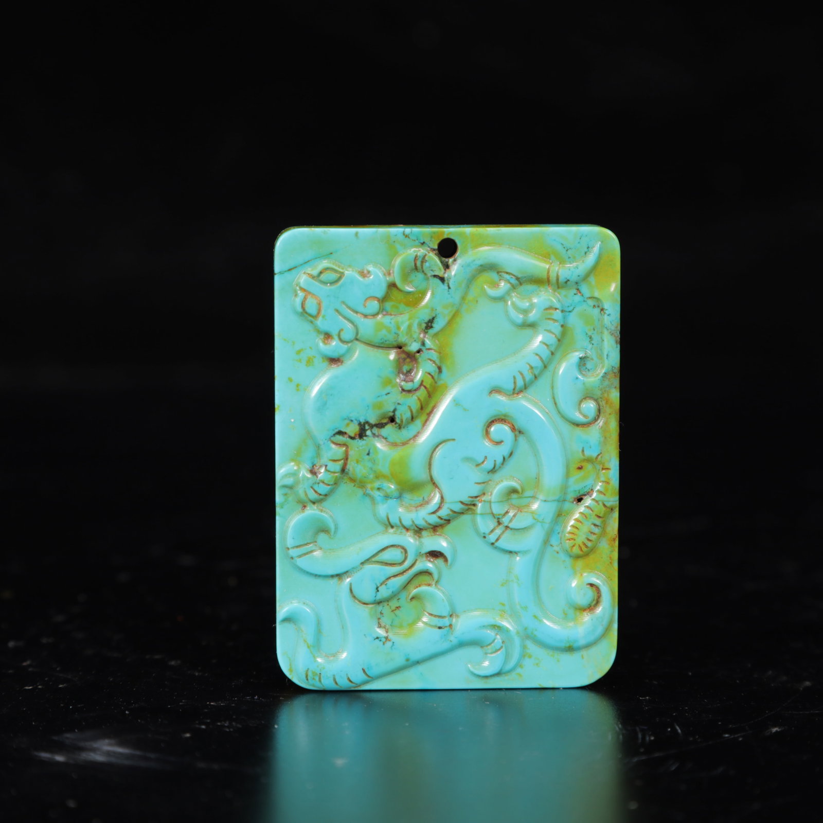 An Exquisite Turquoise Phoenix Pattern Pendant: An Exquisite Turquoise Phoenix Pattern Pendant,The Warring States period in China,Size:1.8inx2.4inx0.4in,Weight:50g 绿松石凤纹挂件,中国战