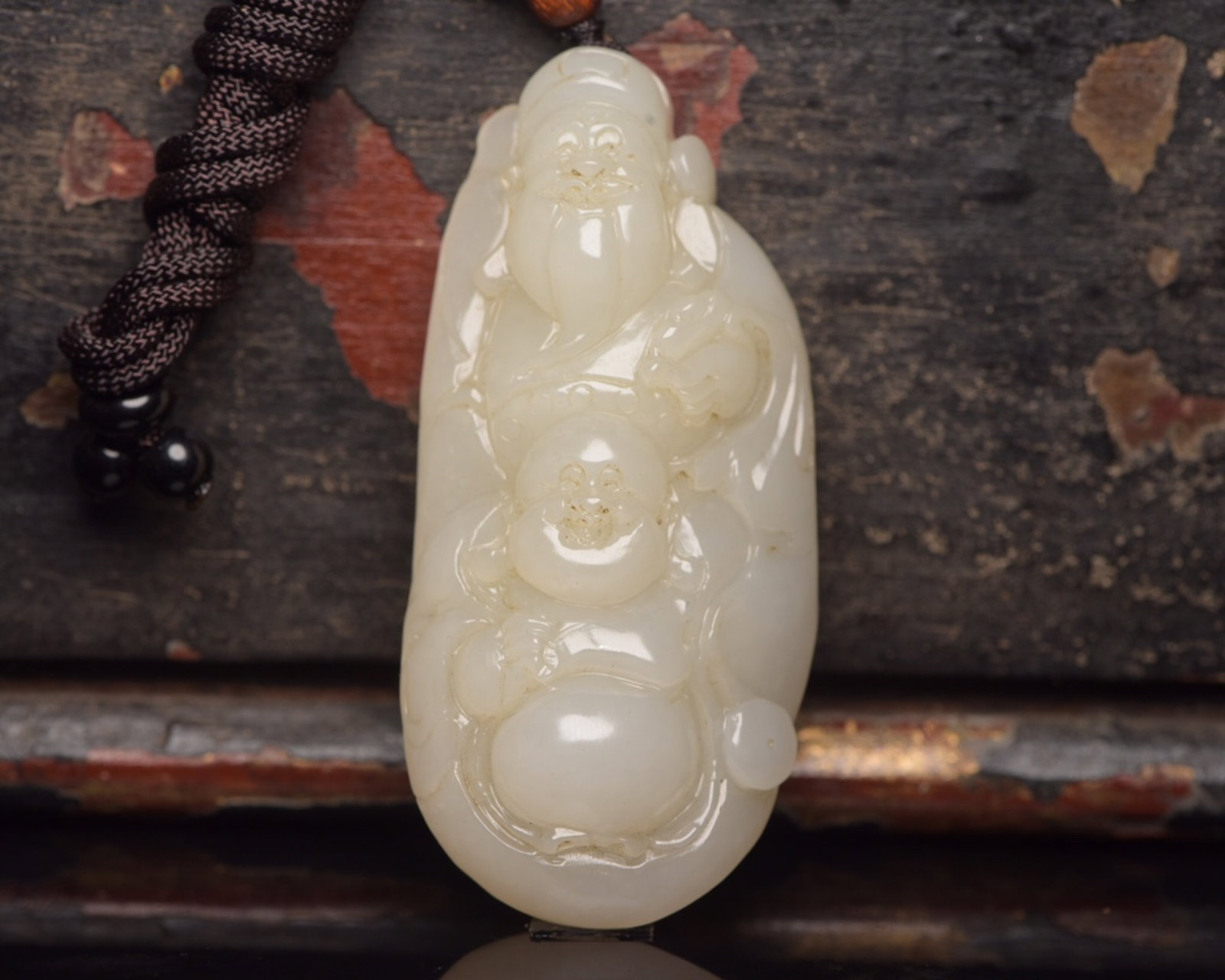 An Exquisite White Jade Figure Pattern Ornament: An Exquisite White Jade Figure Pattern Ornament,Qing Dynasty,China,Size:2.7inx1.3inx0.7in,Weight:62g 白玉人物纹摆件,中国清代
