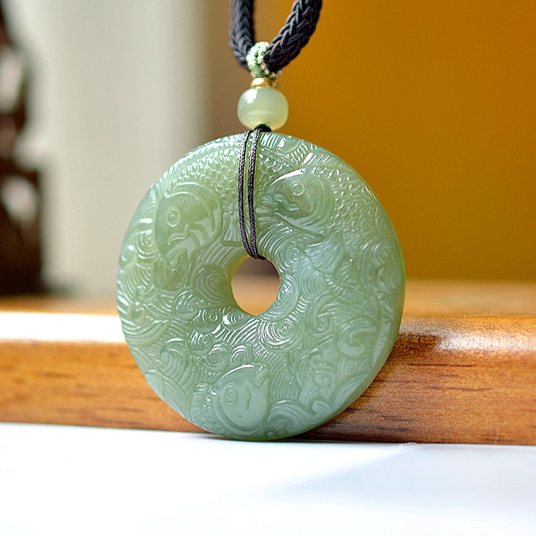 An Exquisite Greenish Jade Fish Pattern Pendant: An Exquisite Greenish Jade Fish Pattern Pendant,Size:49mmx49mm 青玉鱼纹挂件