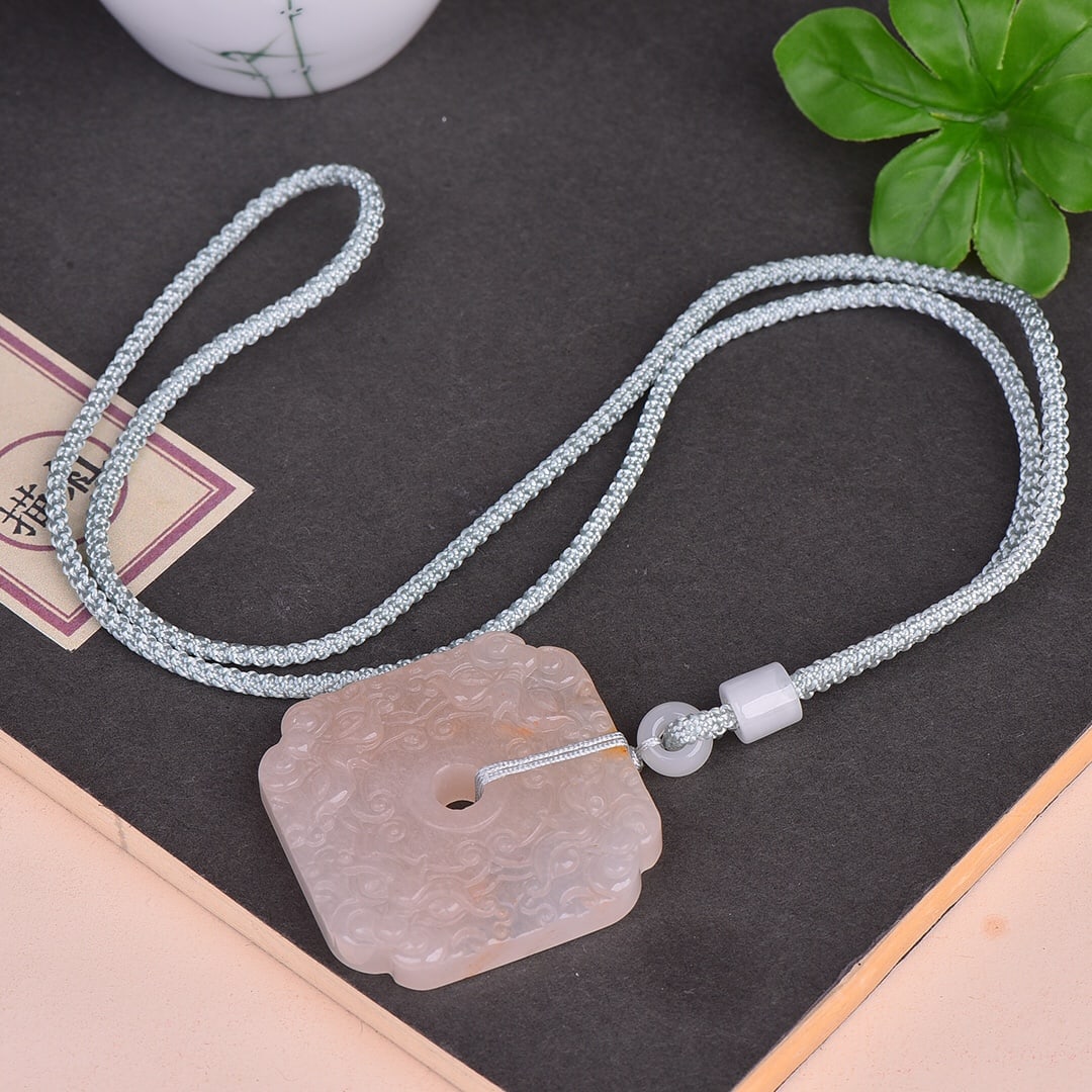 An Exquisite White Jade Pendant: An Exquisite White Jade Pendant,Size:44mm×44mm 白玉挂件