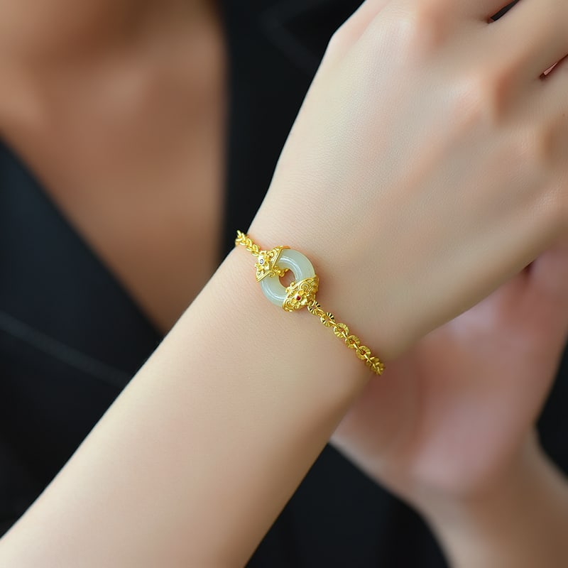 An Exquisite Sterling Silver-Gold Plated Inlaid White Jade Enamel Bracelet: An Exquisite Sterling Silver-Gold Plated Inlaid White Jade Enamel Bracelet 纯银镀金镶白玉珐琅手链